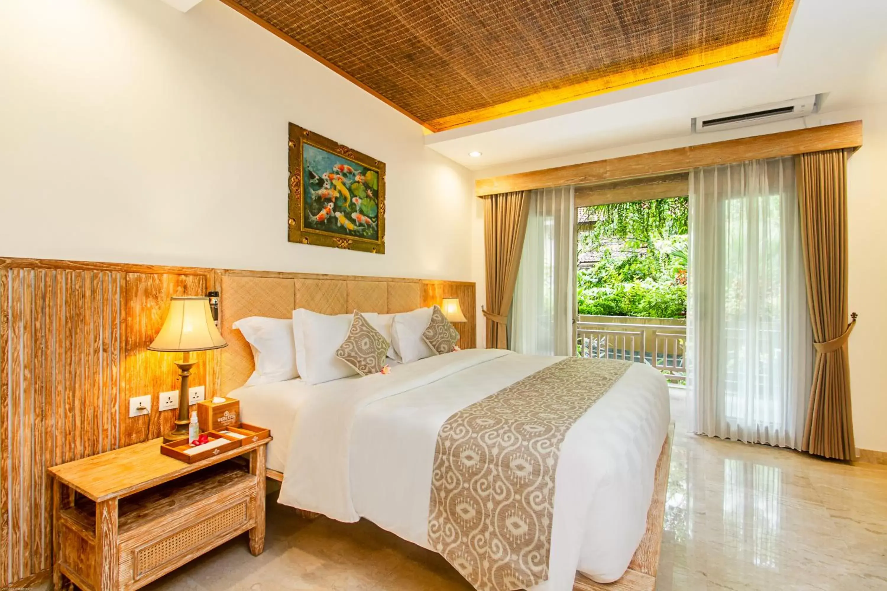 Photo of the whole room, Bed in Weda Cita Resort and Spa by Mahaputra