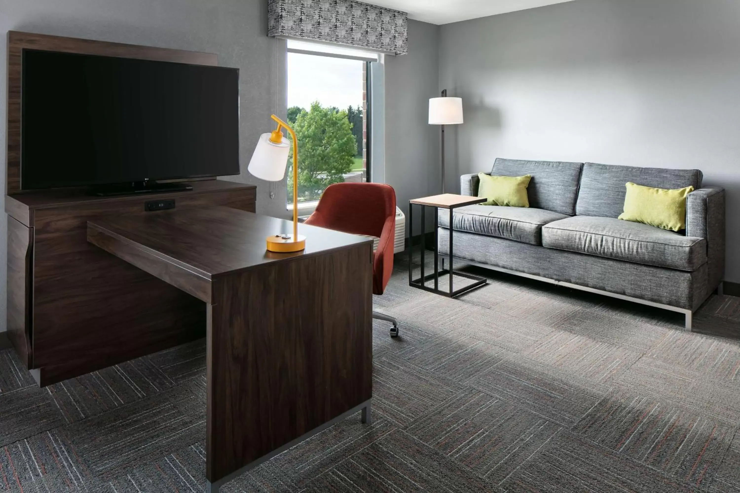Bedroom, Seating Area in Hampton Inn & Suites West Bend