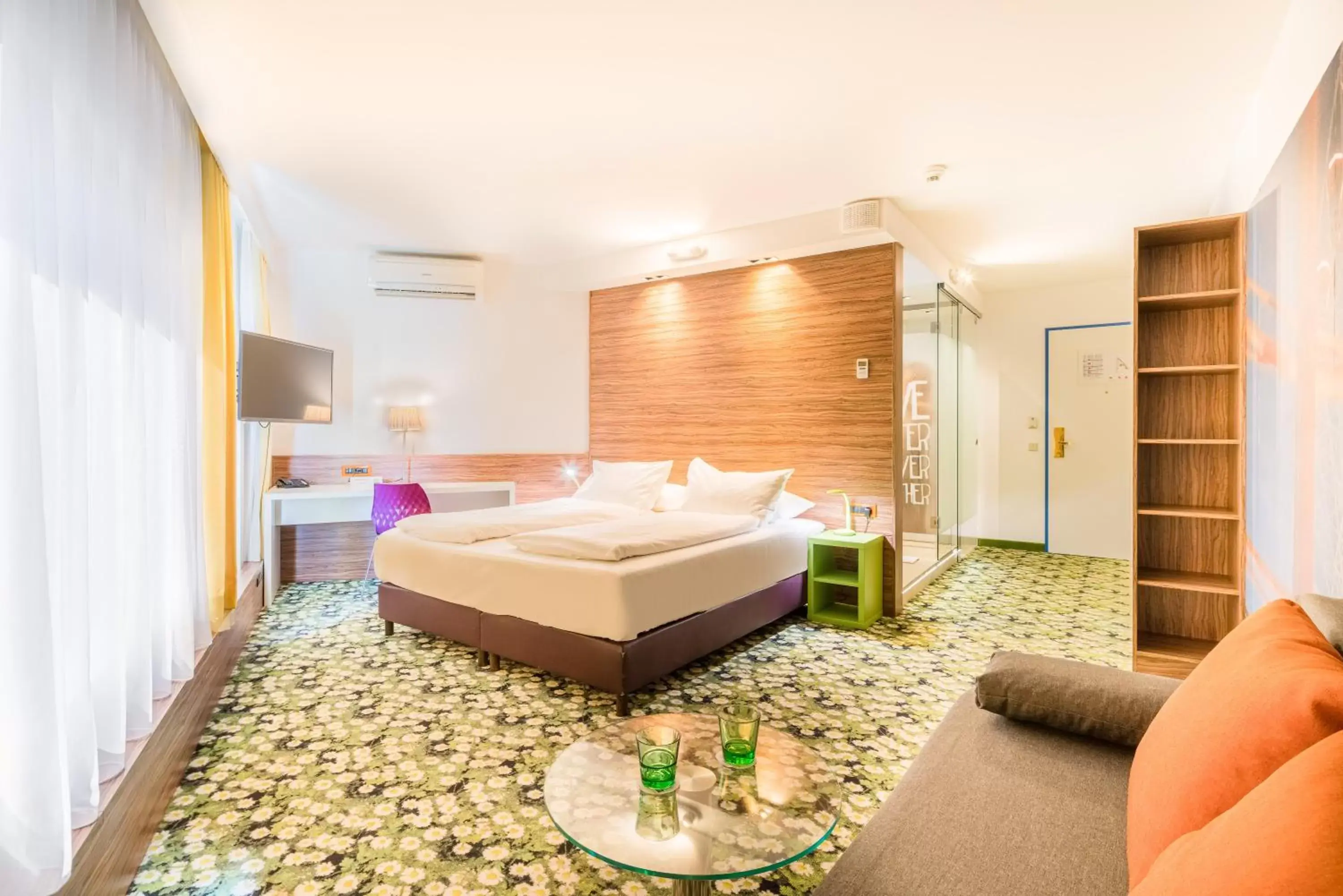 Living room, Bed in Ibis Styles Wien City