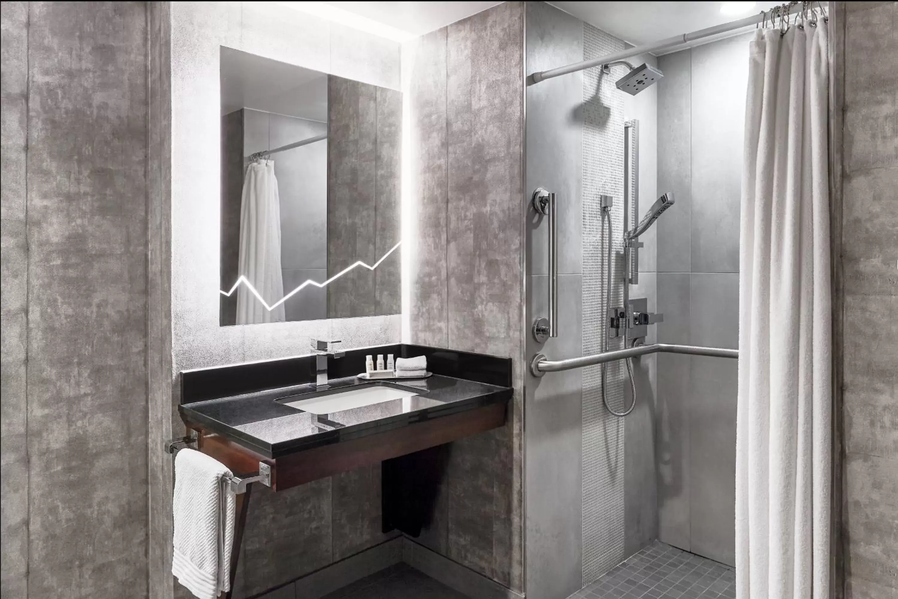 Bathroom in Renaissance Denver Central Park Hotel