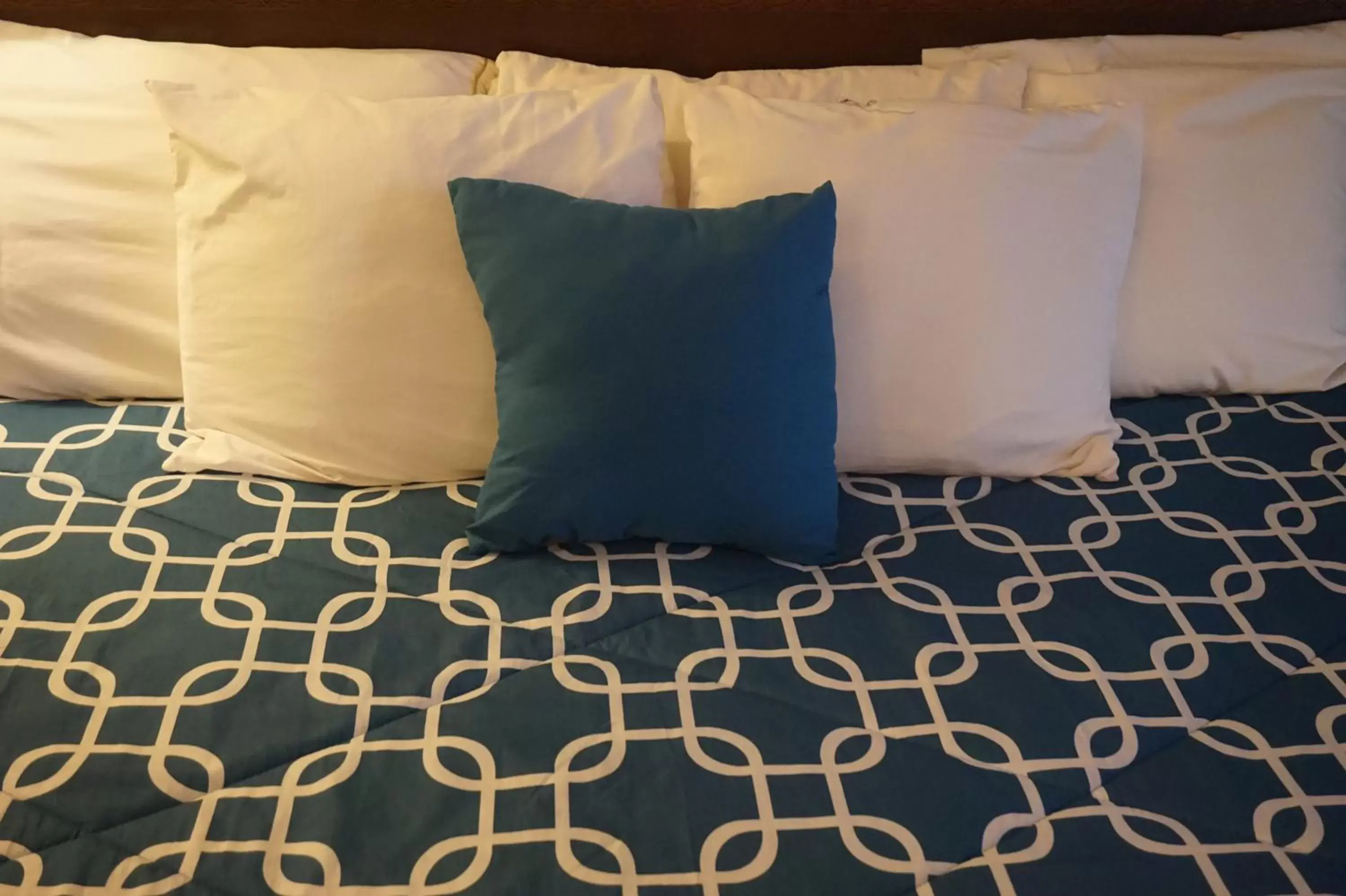 Bed in Bellevue Hotel and Suites