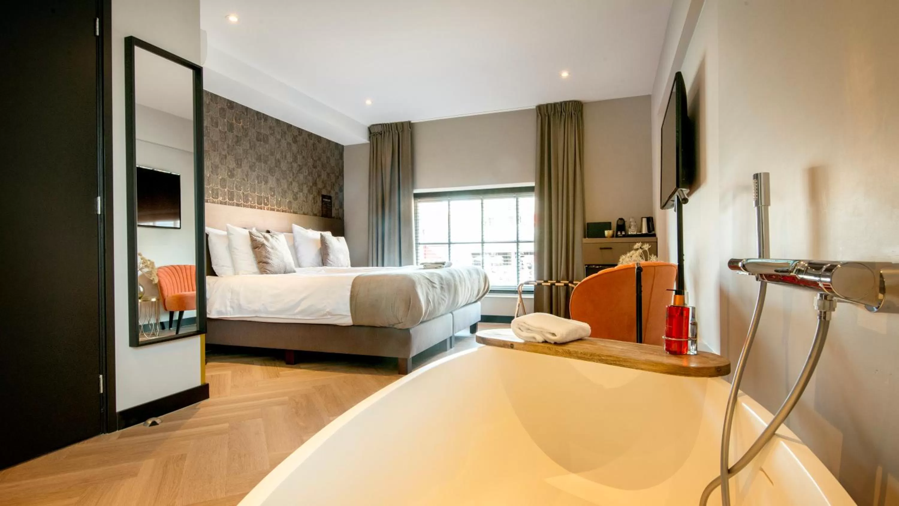 Bed in Harbour Suites Boutique Hotel