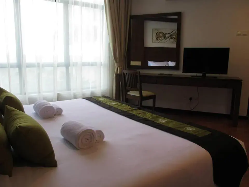 Bed in Samsuria Beach Resort & Residence