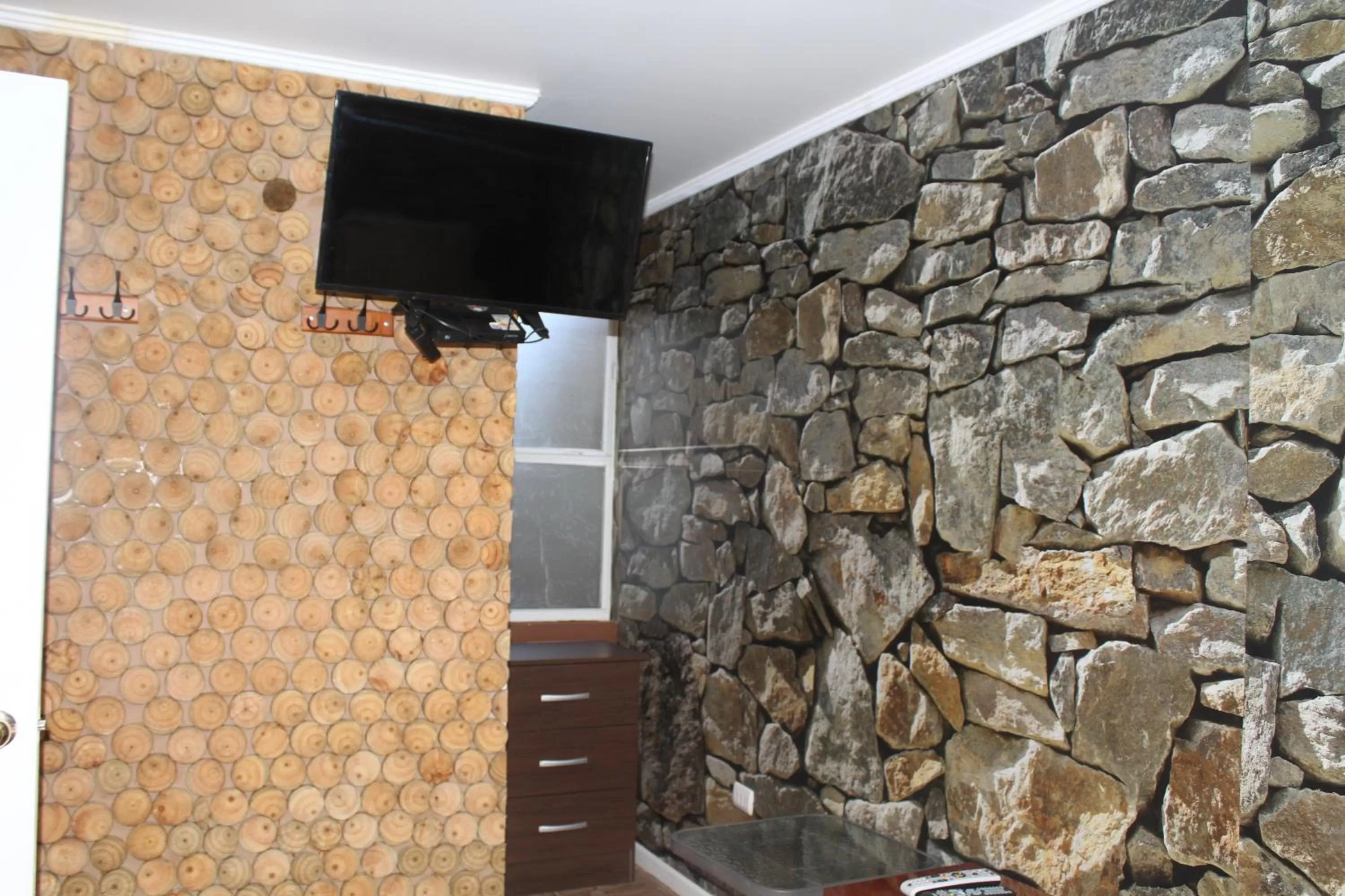 TV/Entertainment Center in Hotel Manada del Desierto