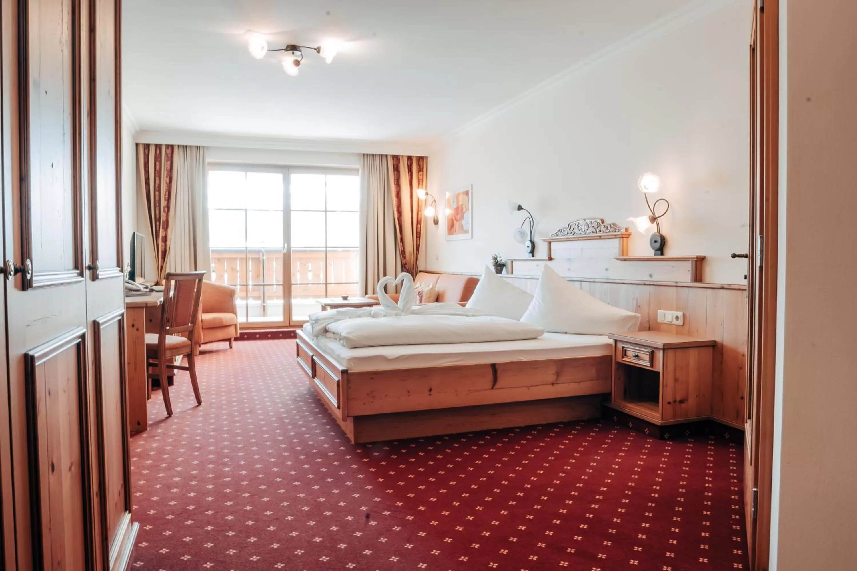 Photo of the whole room, Bed in POST POST Hotel - Alpine Boutique Hotel & Spa