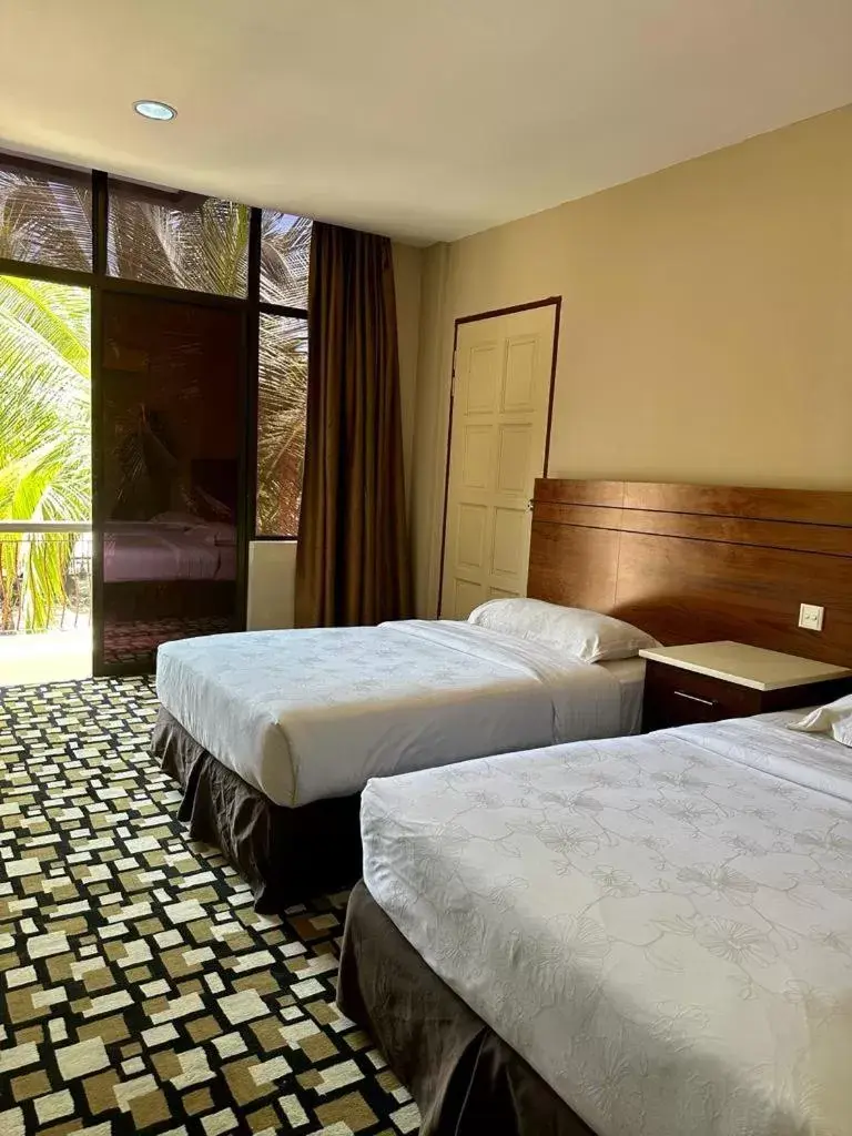 Bed in Malibest Resort