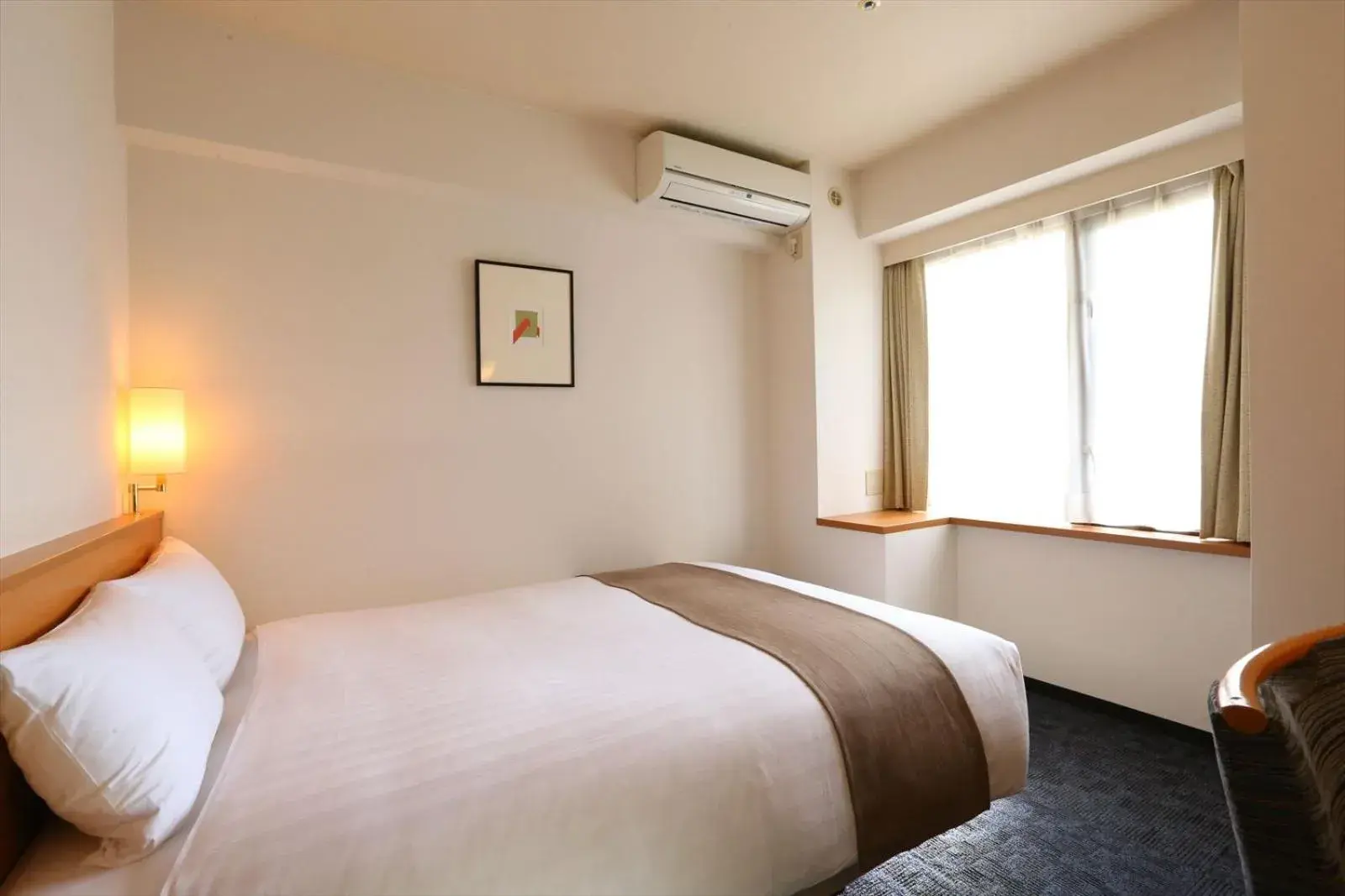 Bed in Hotel Hokke Club Hiroshima