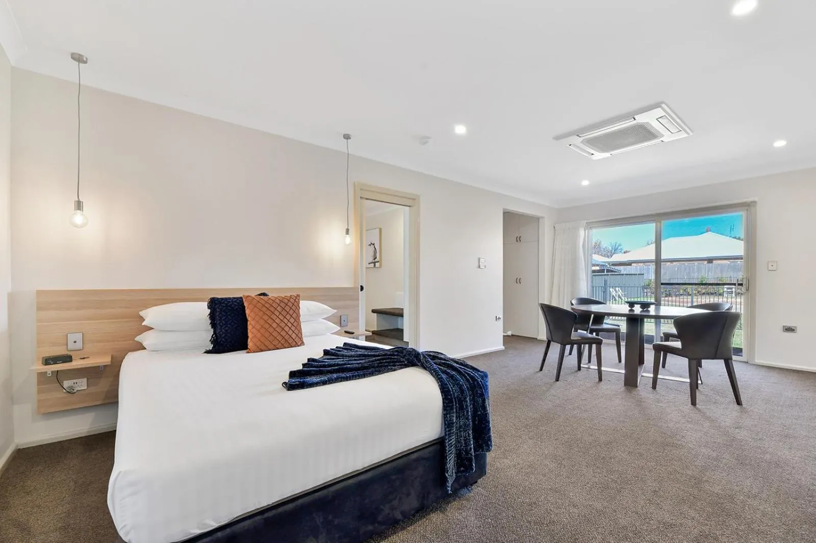 Bed in Central Caleula Motor Lodge