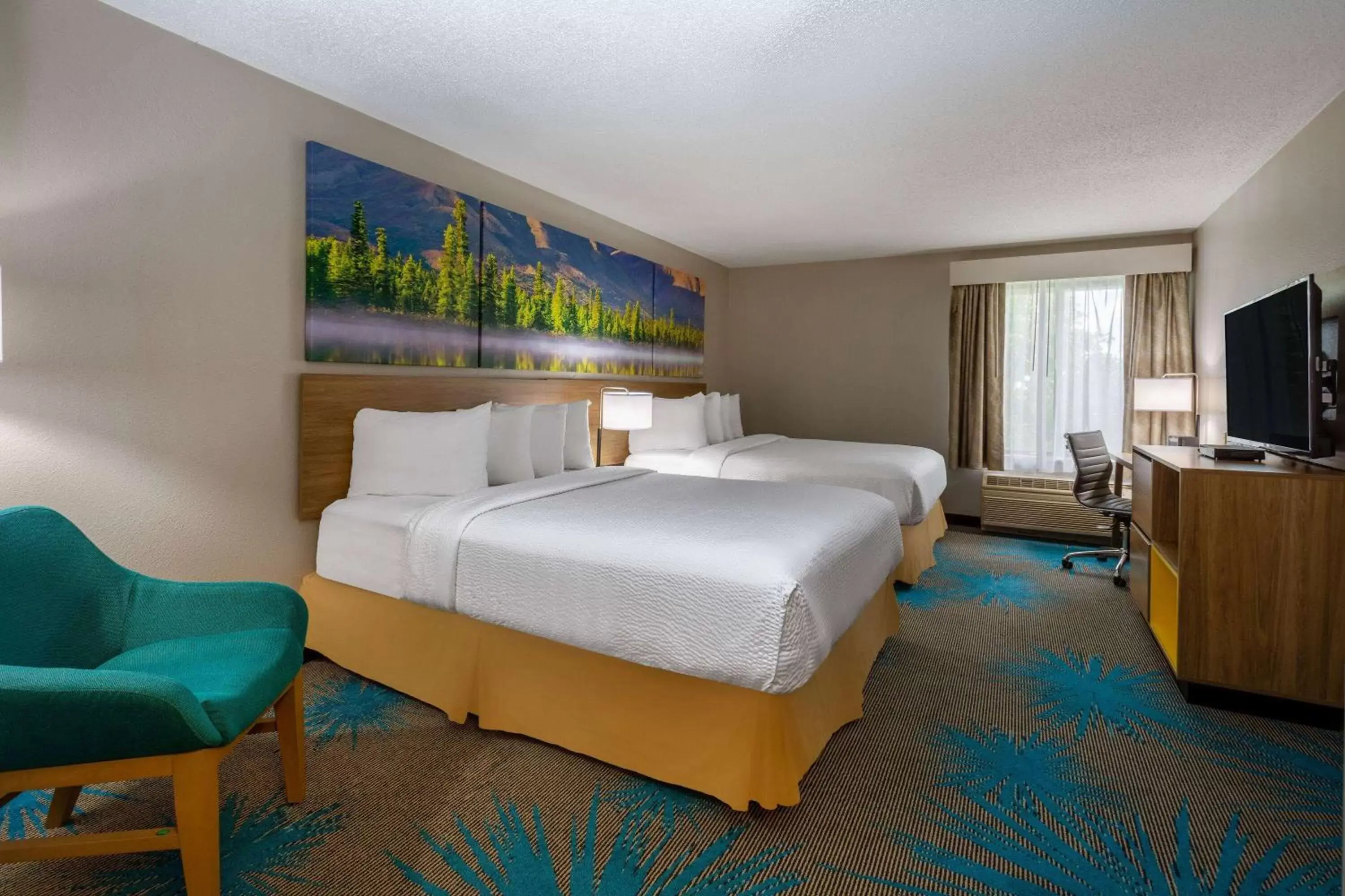 Photo of the whole room, Bed in Days Inn & Suites by Wyndham Denver International Airport