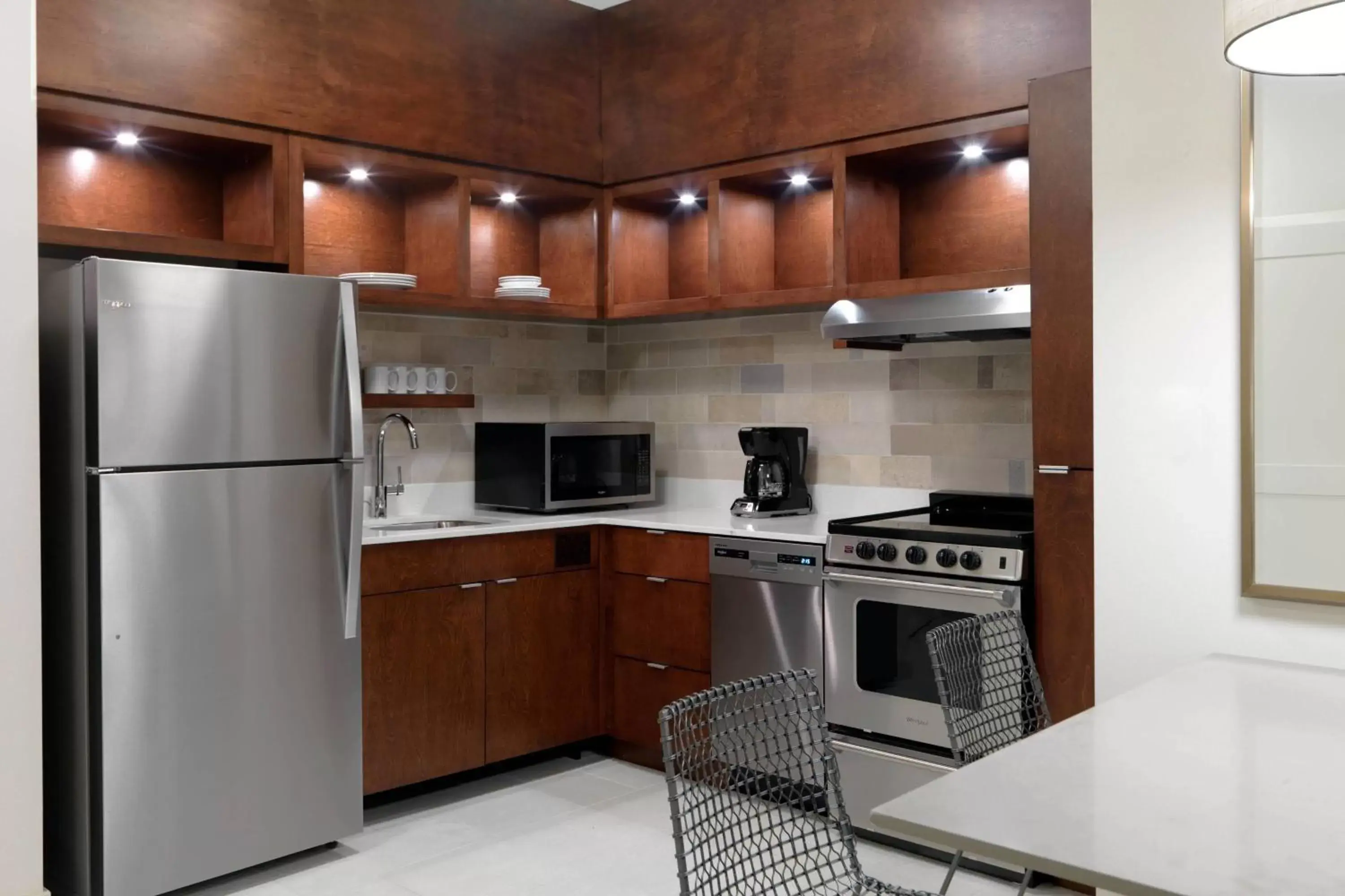 Bedroom, Kitchen/Kitchenette in TownePlace Suites by Marriott Orlando Downtown
