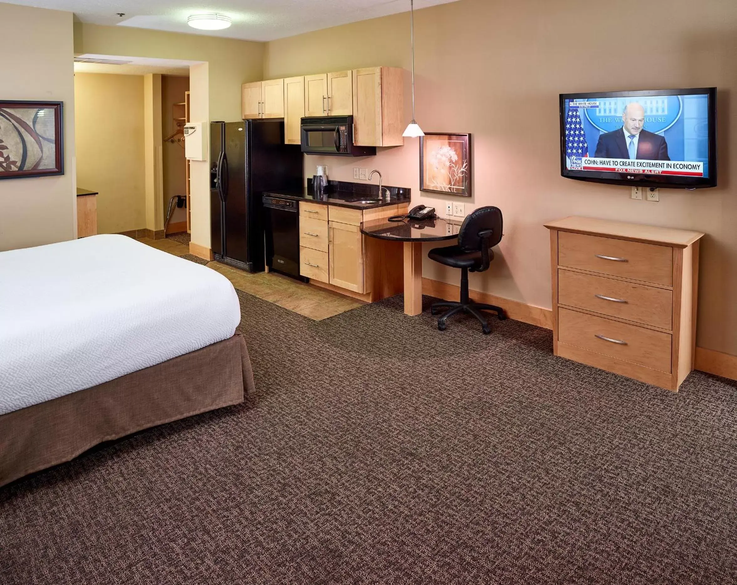 Photo of the whole room, TV/Entertainment Center in LivINN Hotel Minneapolis North / Fridley