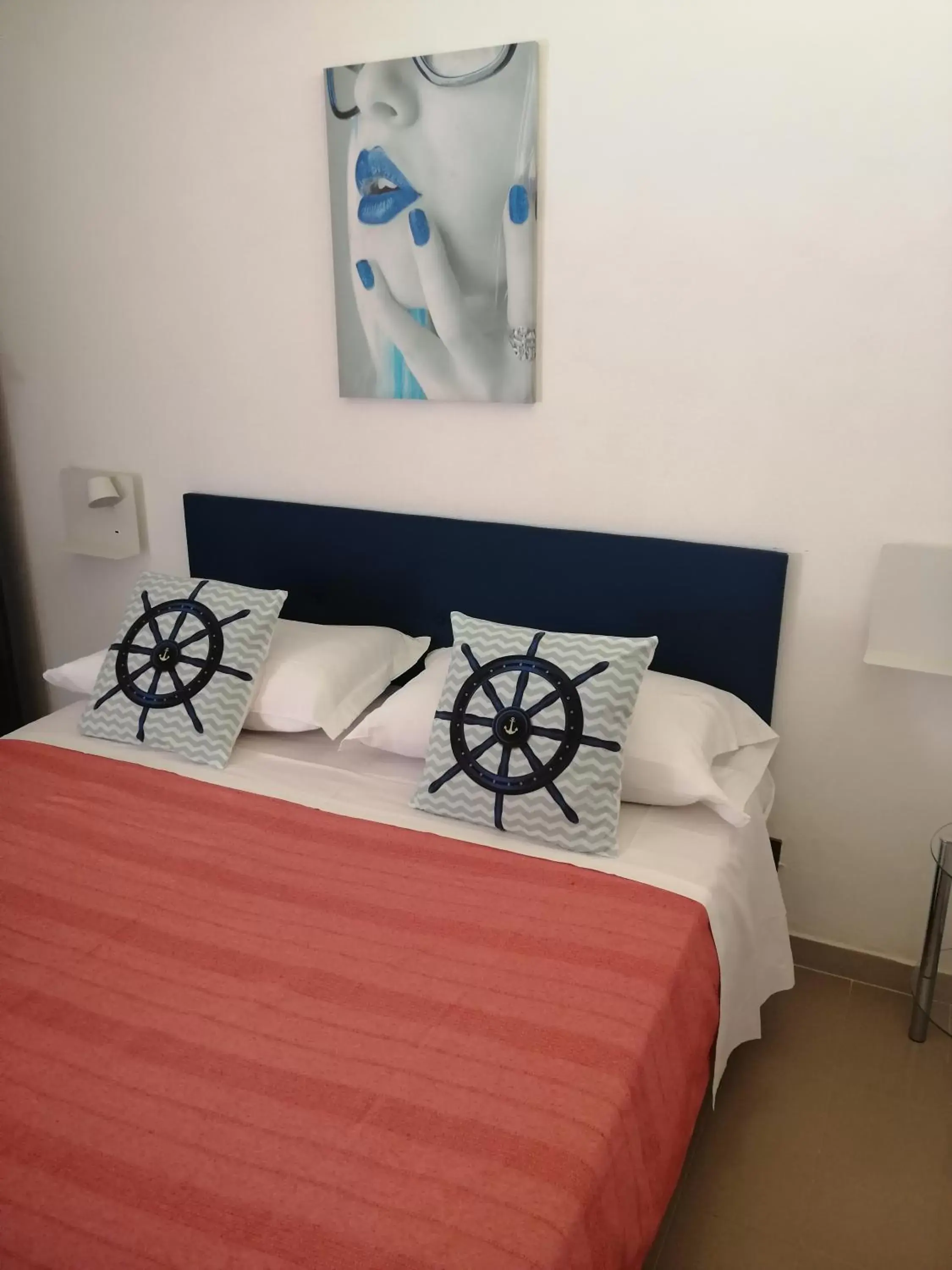 Bed in b&b Le Rocce