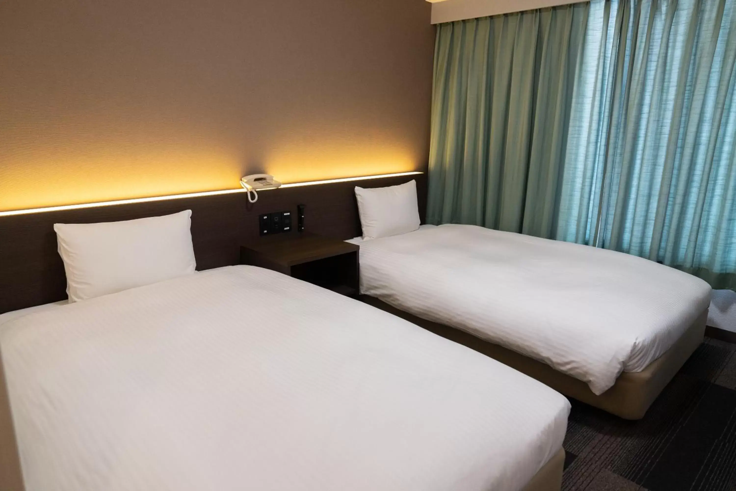 Photo of the whole room, Bed in Heiwadai Hotel Tenjin