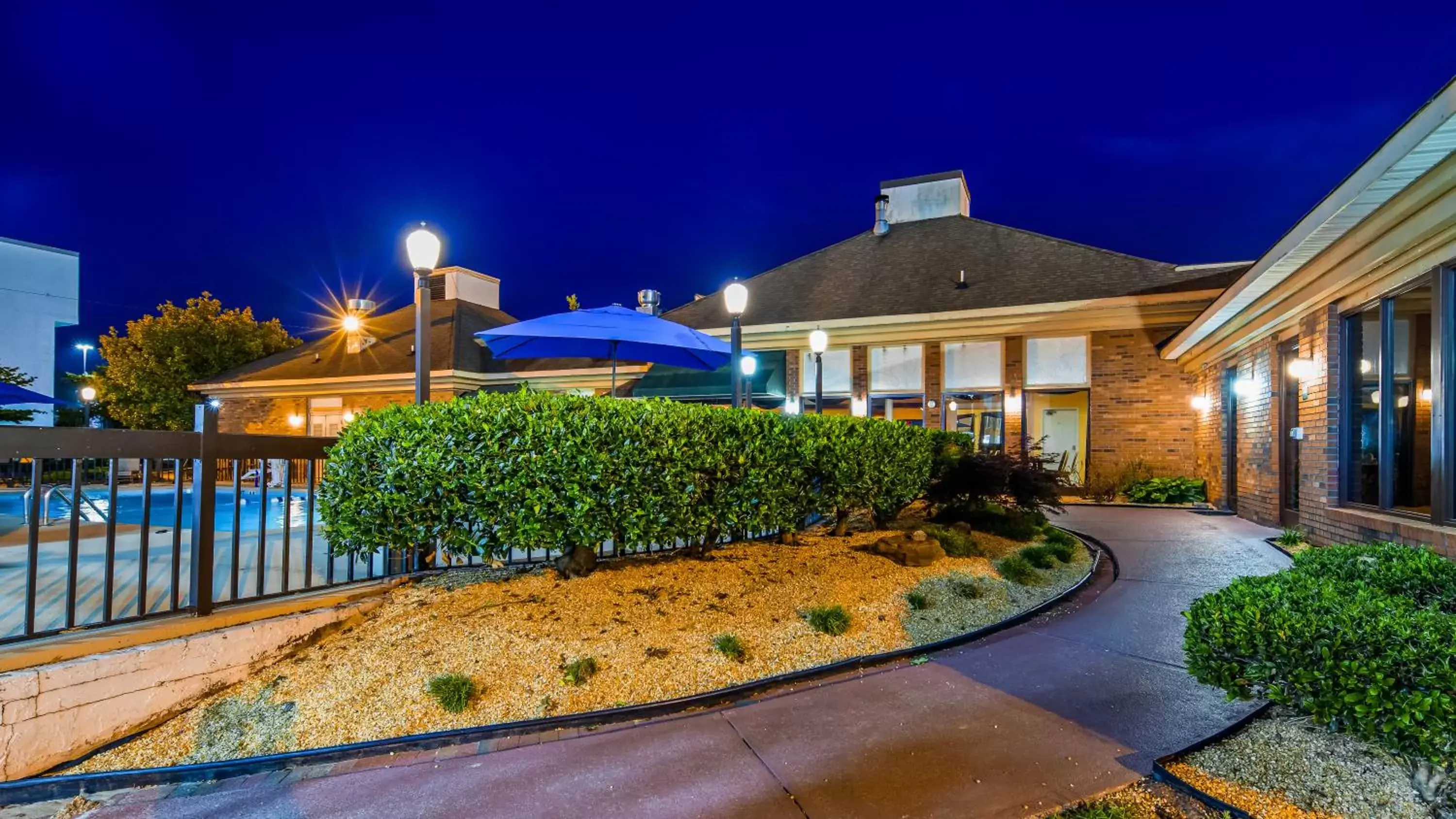 Garden view, Property Building in SureStay Plus Hotel by Best Western Fayetteville