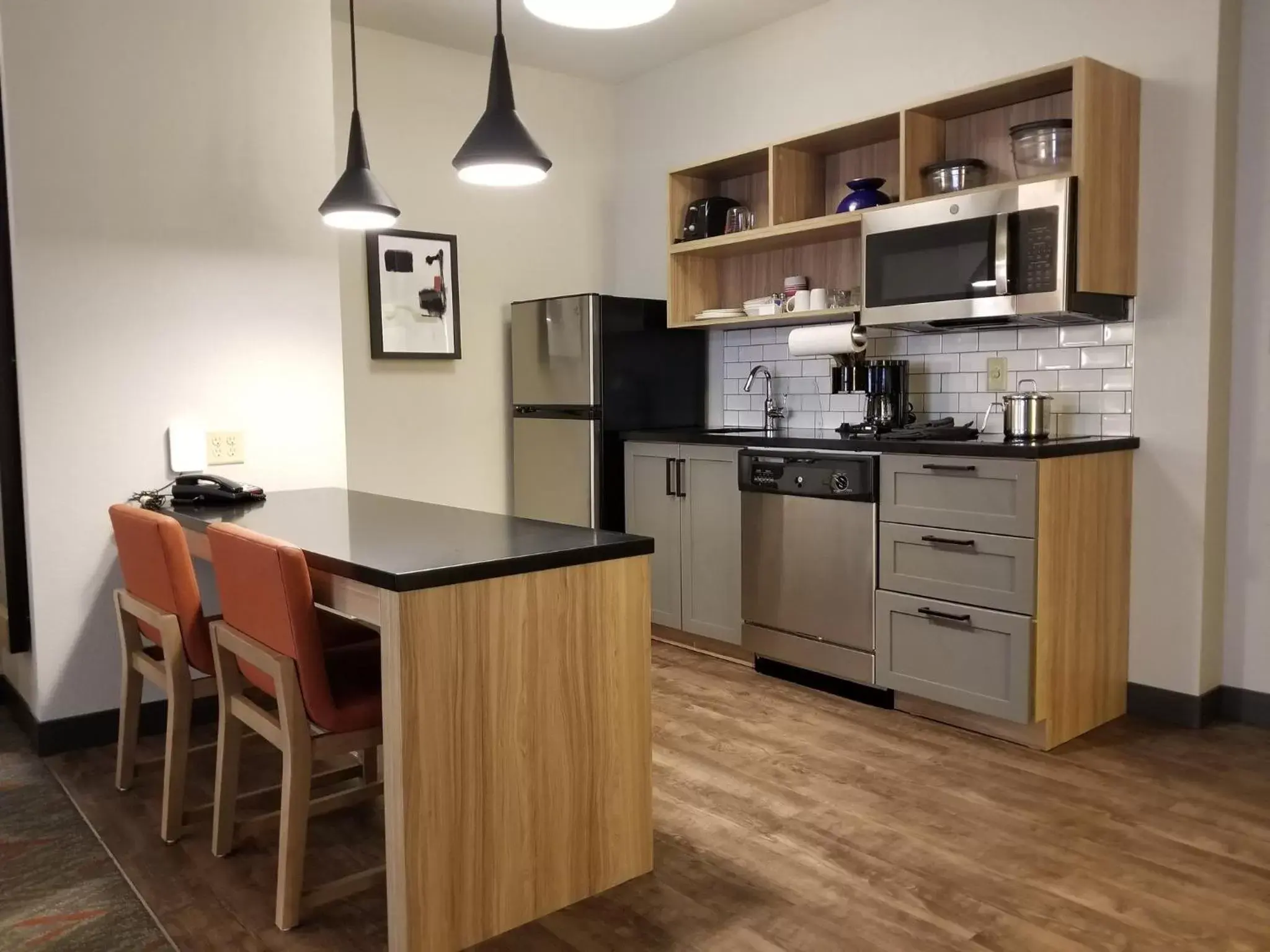 Photo of the whole room, Kitchen/Kitchenette in Candlewood Suites Apex Raleigh Area, an IHG Hotel