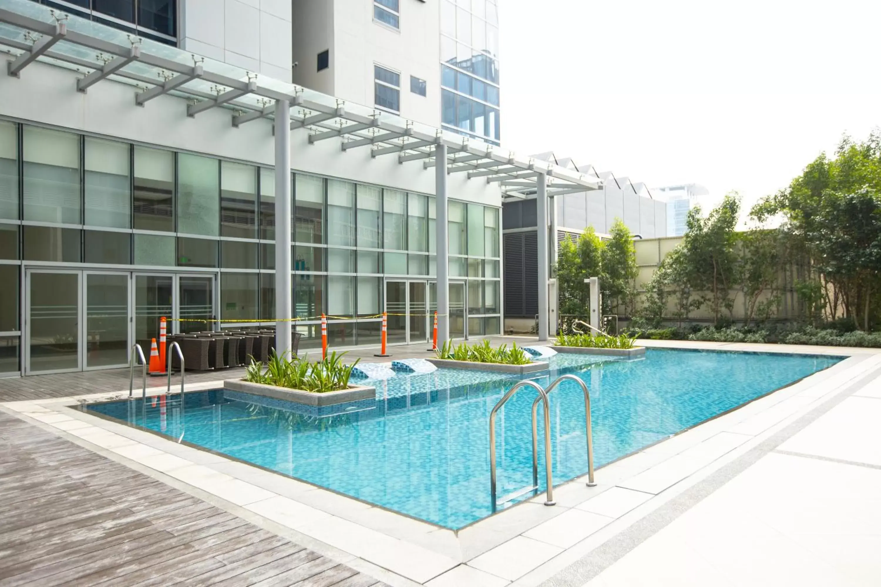 Pool view in 1BR Suite in Uptown BGC Pool view in 1BR Suite in Uptown BGC