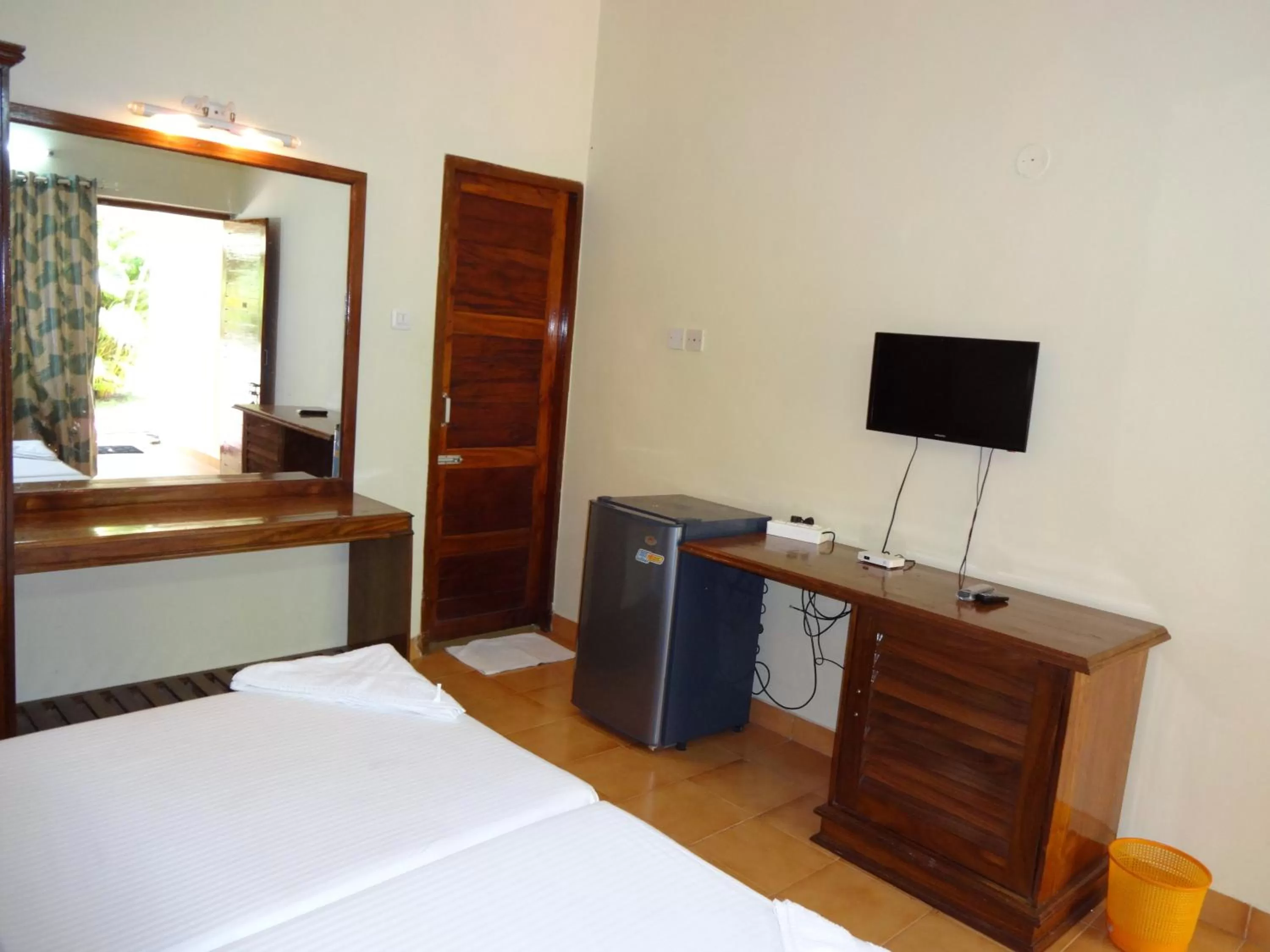 Bed in Hotel Thushara