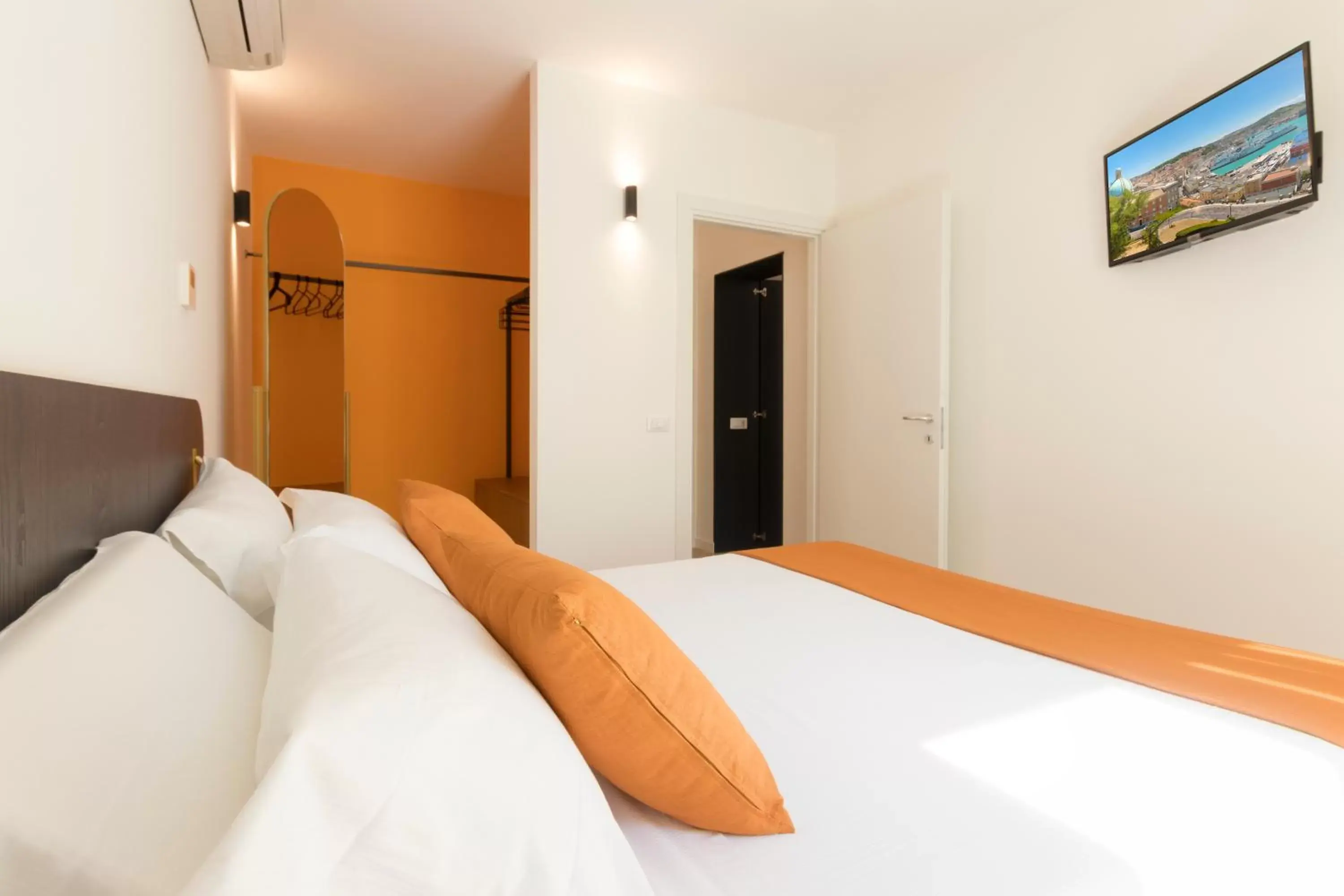 Bed in Metropolitan Suites