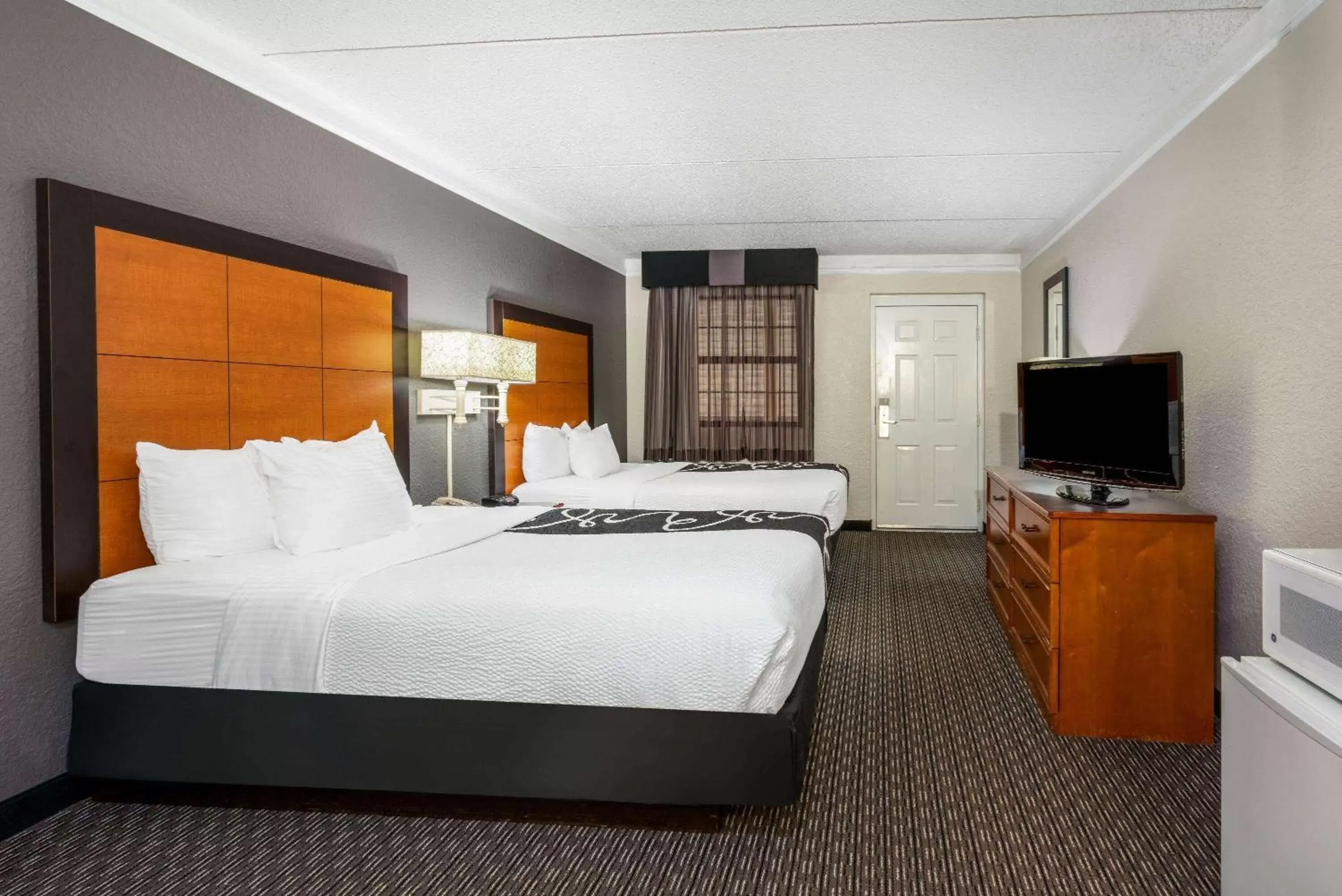 Photo of the whole room, Bed in Super 8 by Wyndham The Woodlands North