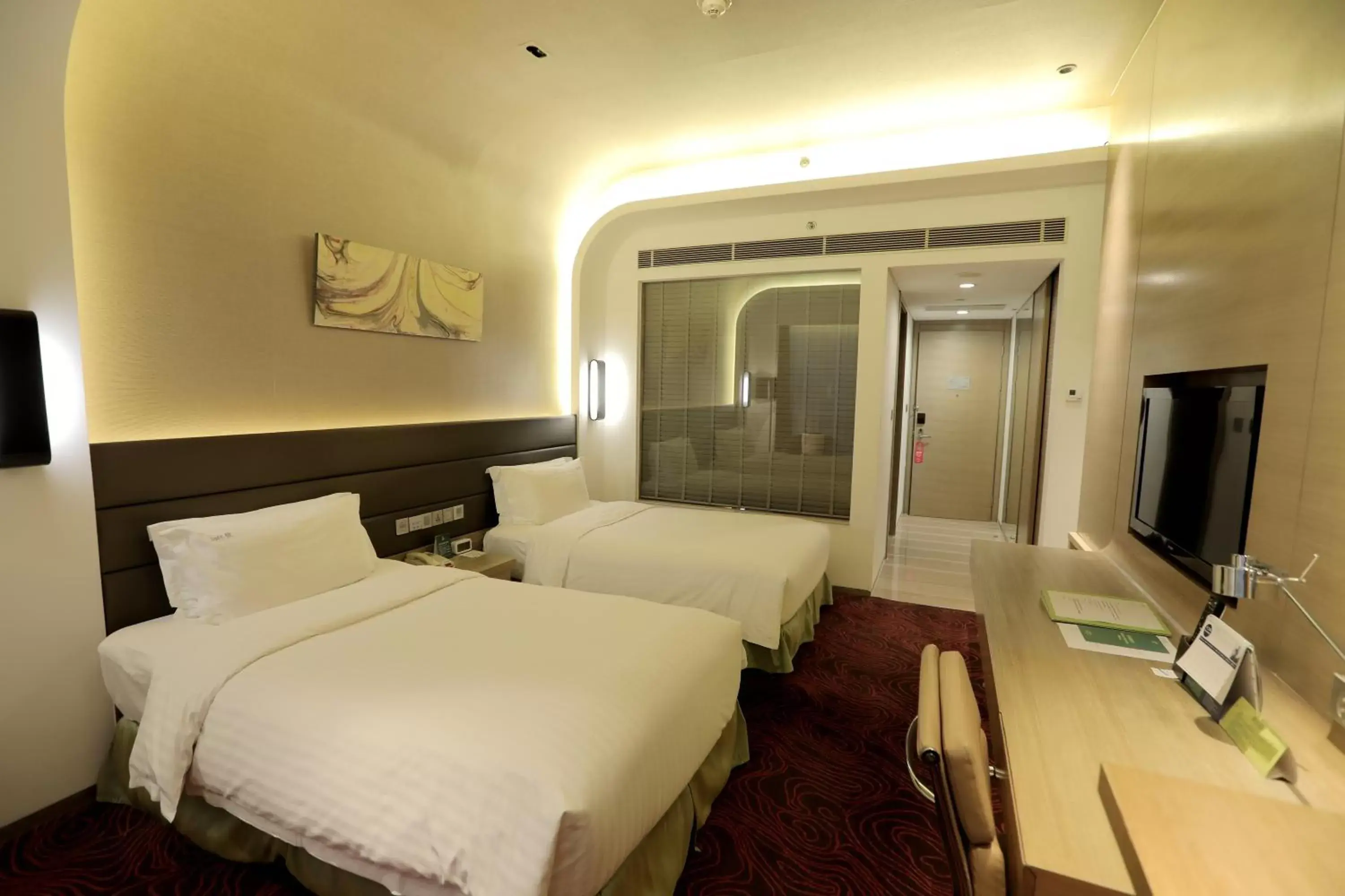 Bed in Holiday Inn Shanghai Songjiang, an IHG Hotel - Miaoqian Street