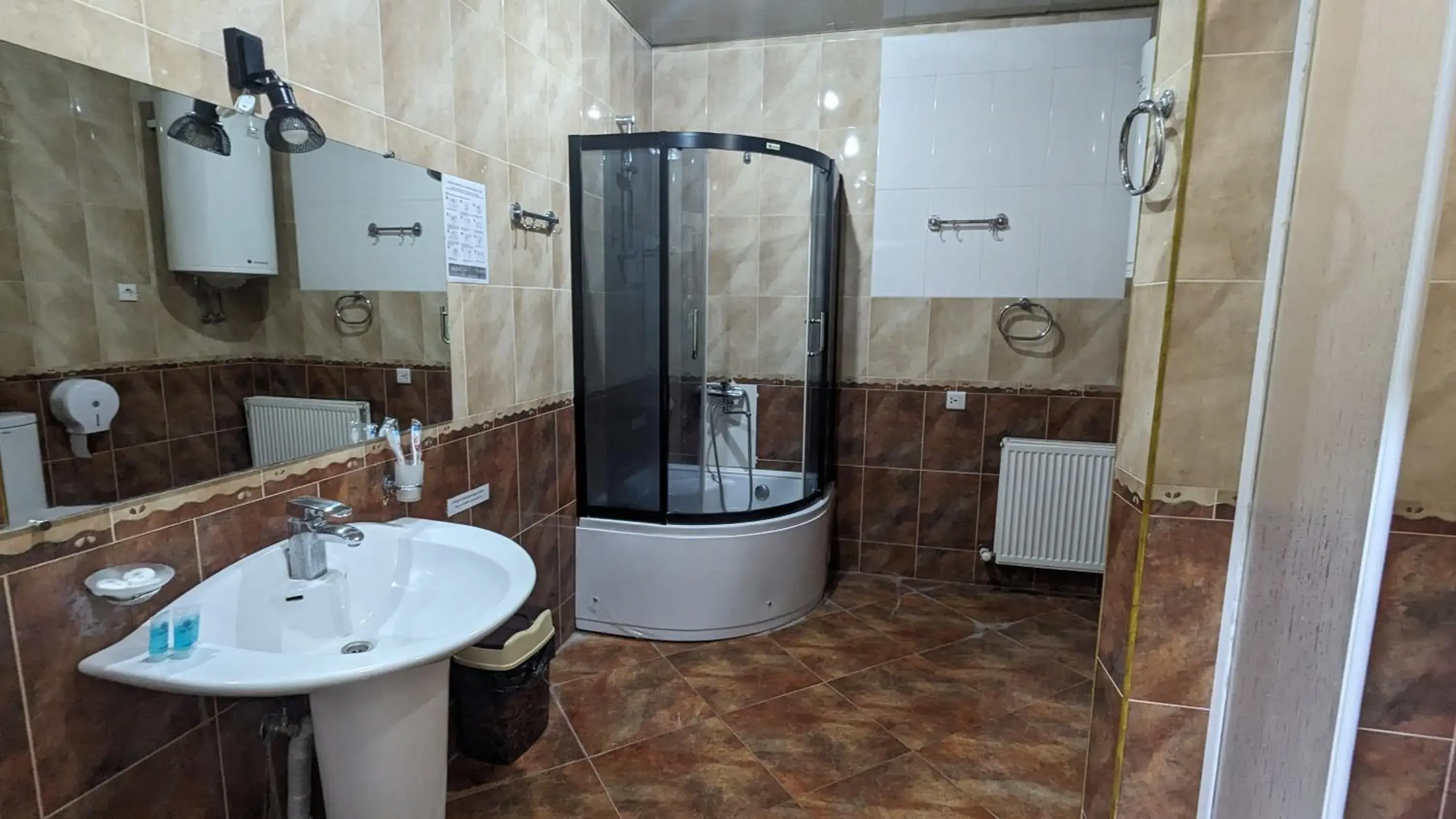 Bathroom in Dkd-bridge Hotel