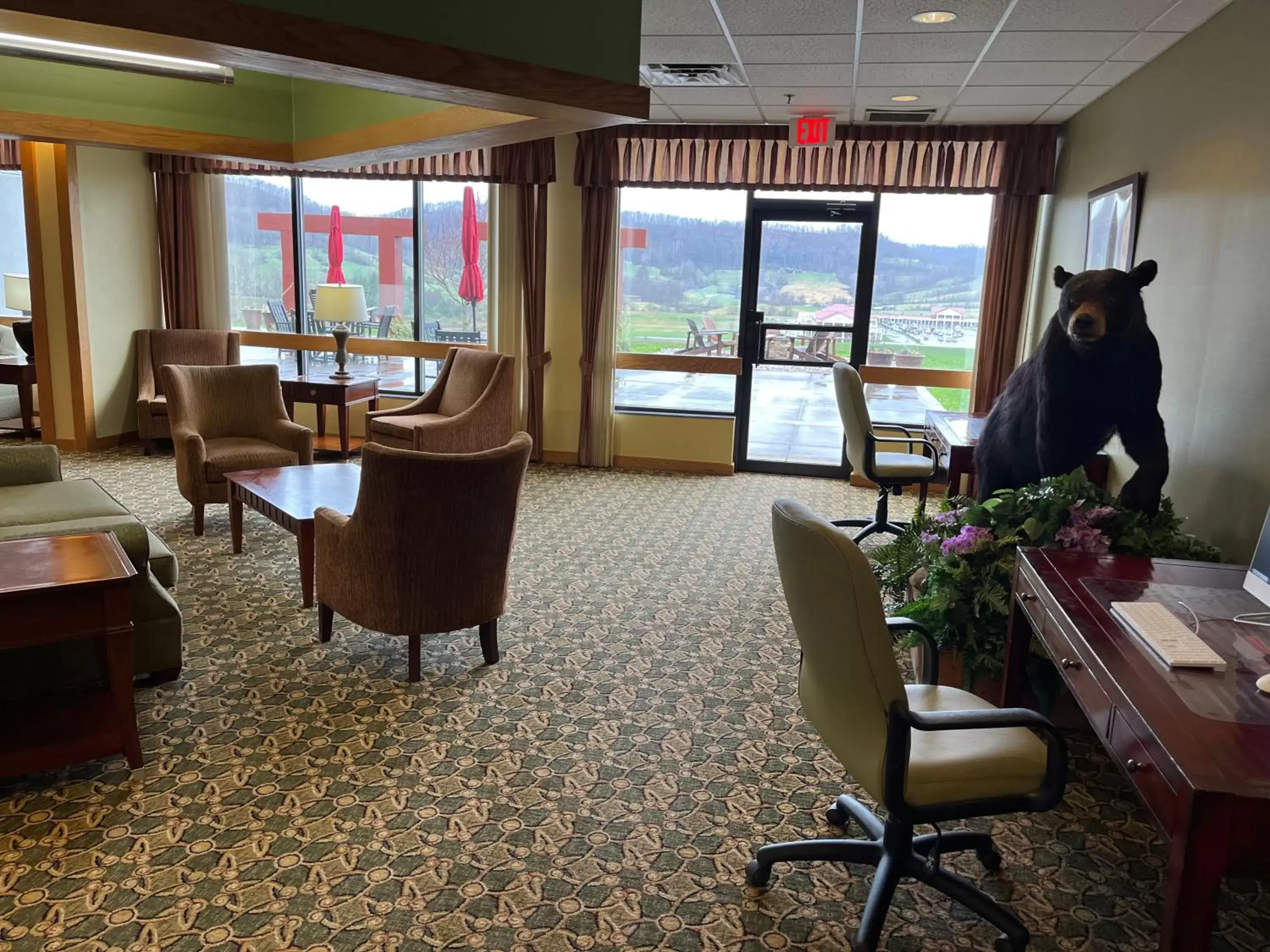 Lobby or reception in Days Inn & Suites by Wyndham Sutton Flatwoods Lobby or reception in Days Inn & Suites by Wyndham Sutton Flatwoods