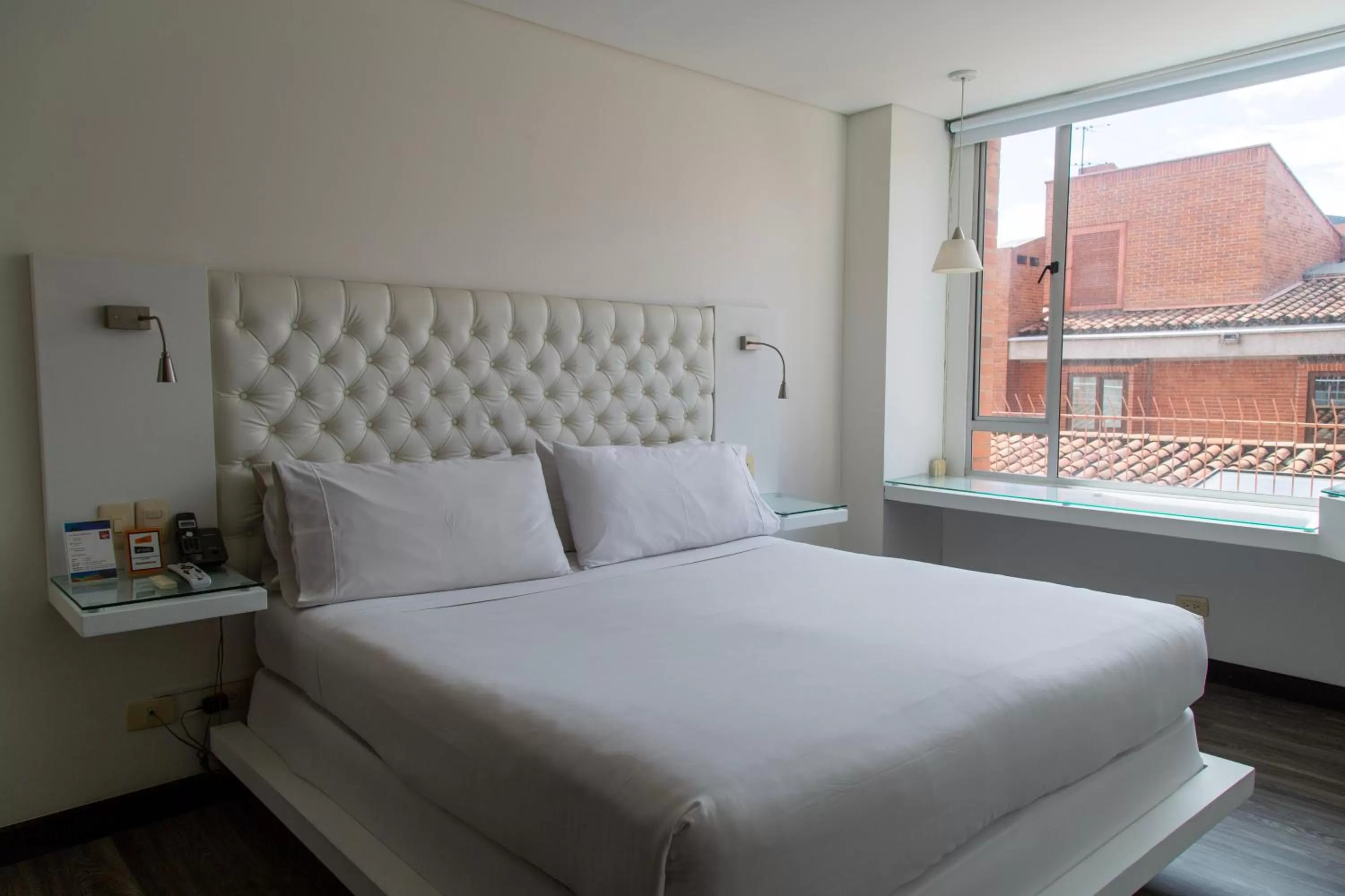 Bed in Hotel 104 Art Suites