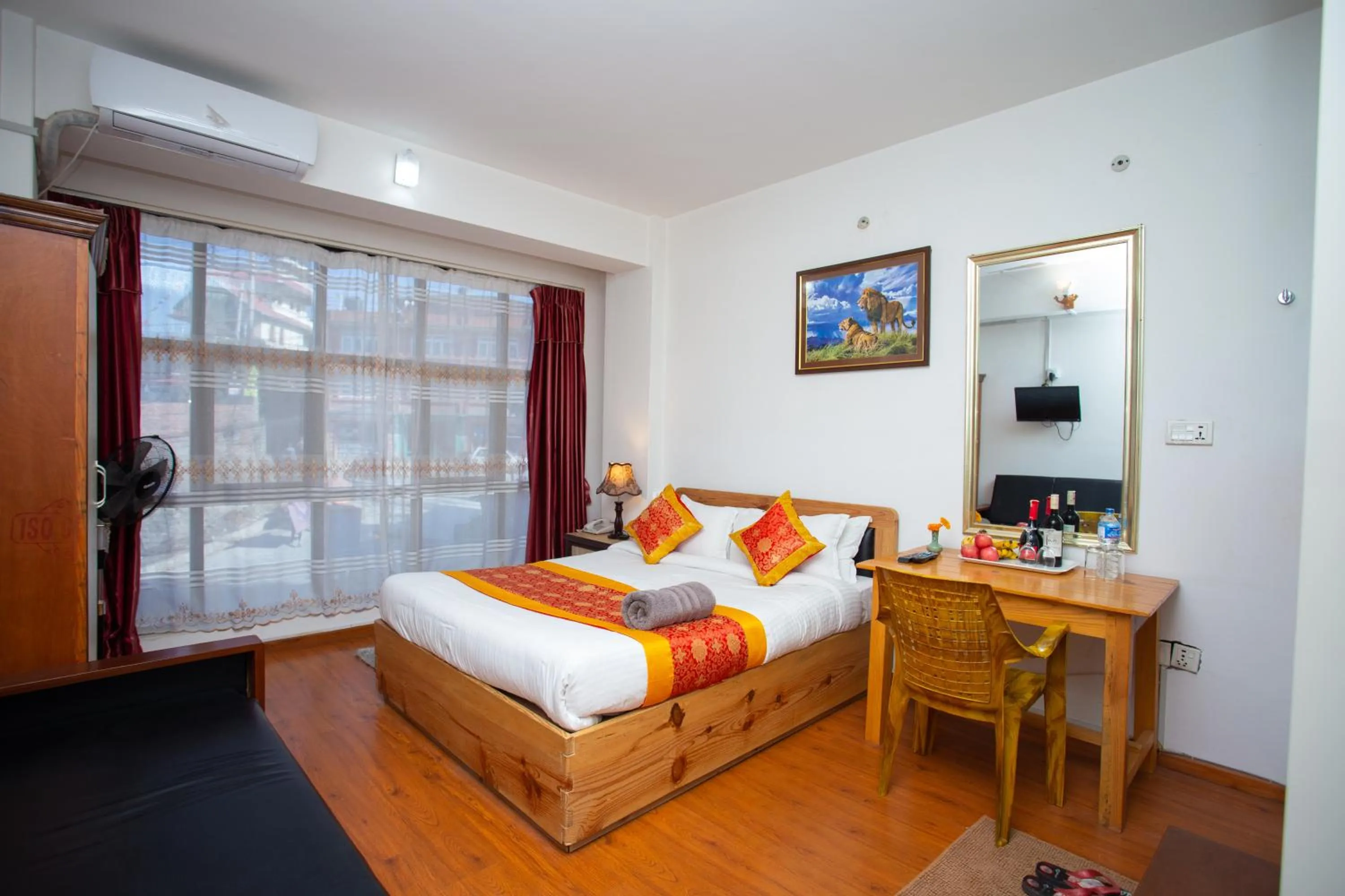 Photo of the whole room, Bed in The Boudha Inn