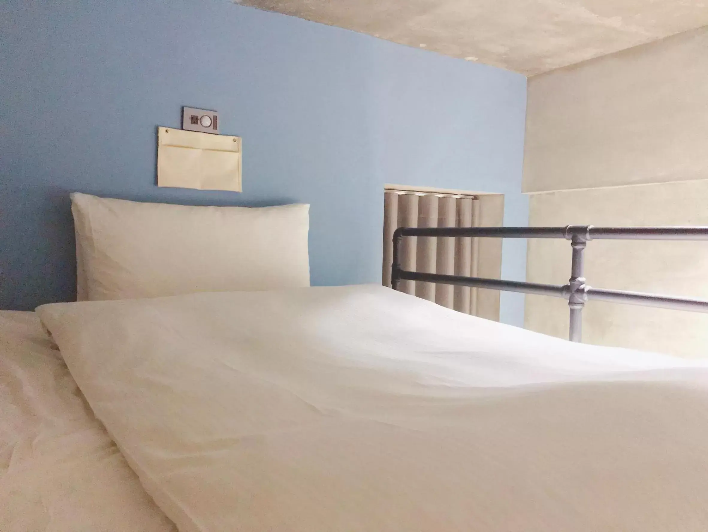 Bed in MINI HOTELS (Feng Jia Branch)