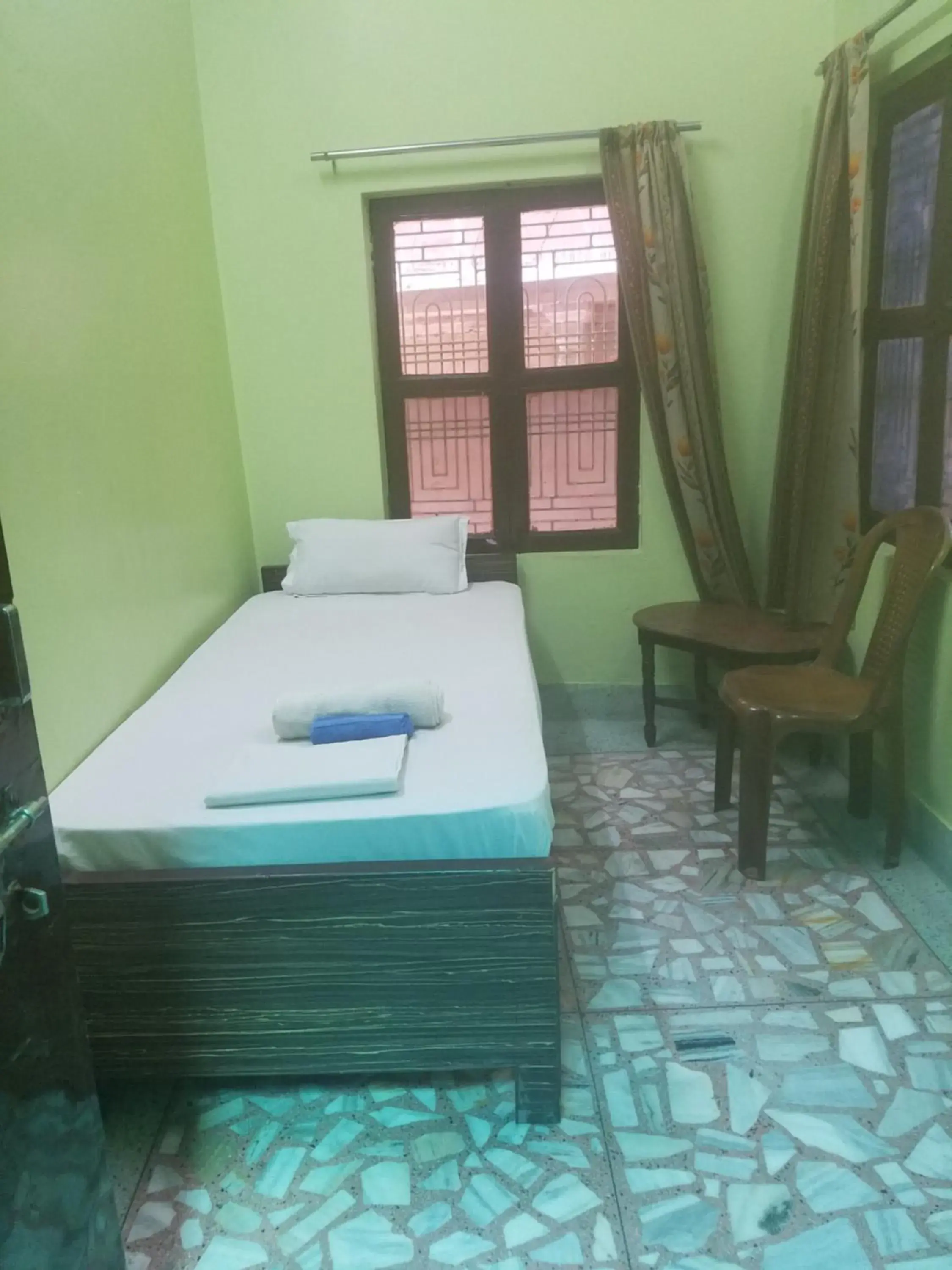 Bed in Baba Guest House