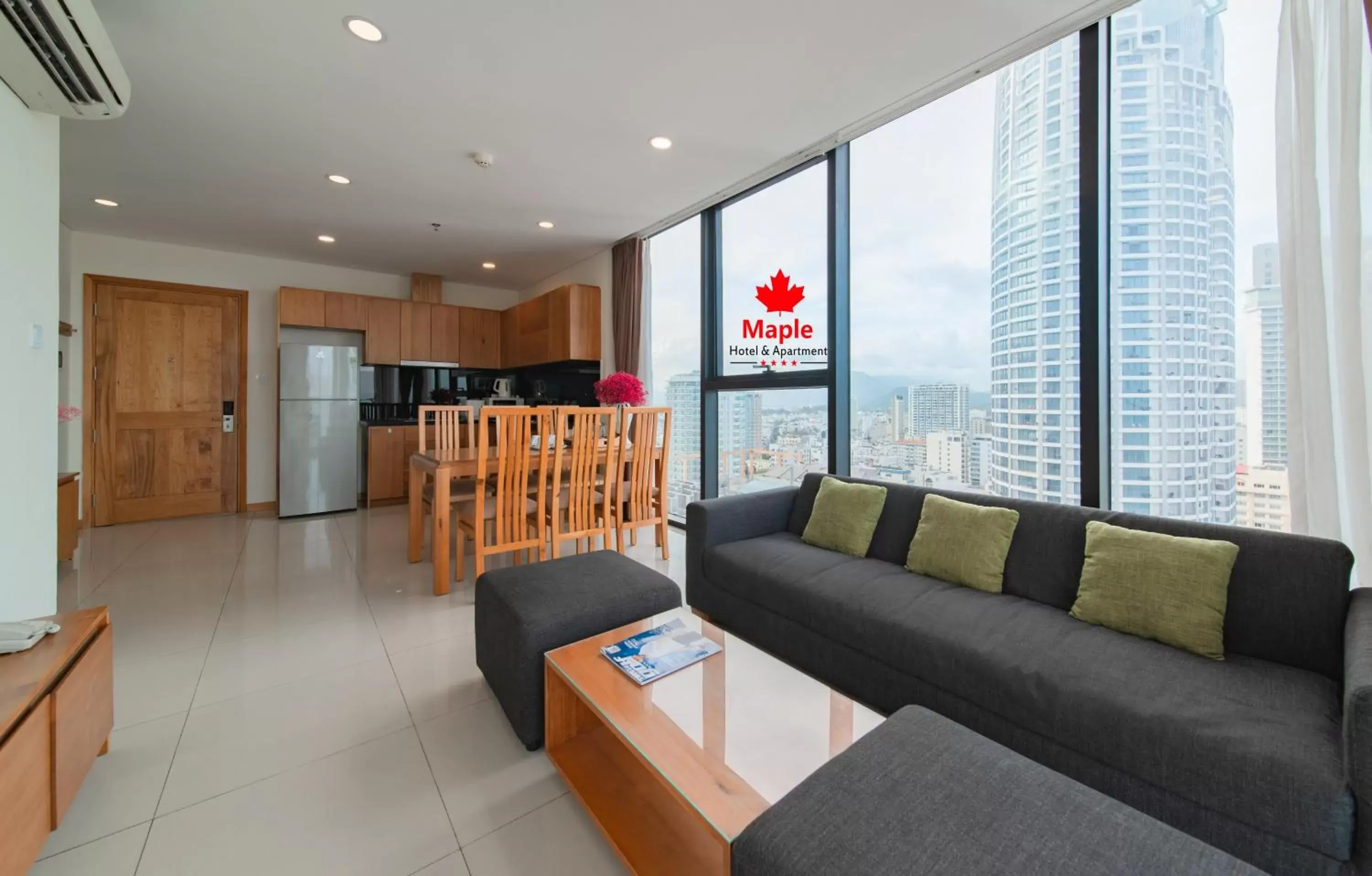 Living room in Maple Hotel & Apartment