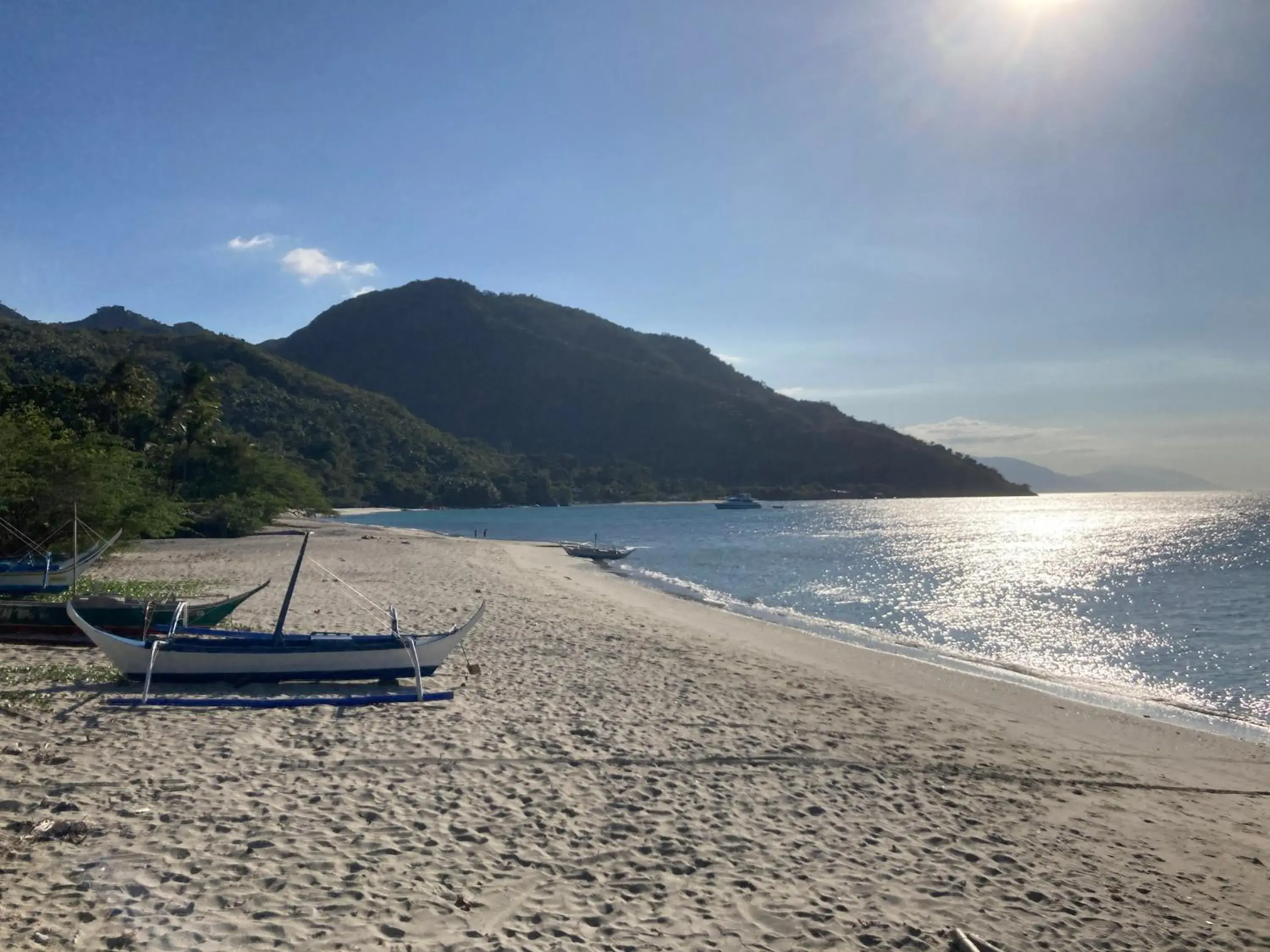 Beach in Sunset At Aninuan Beach Resort