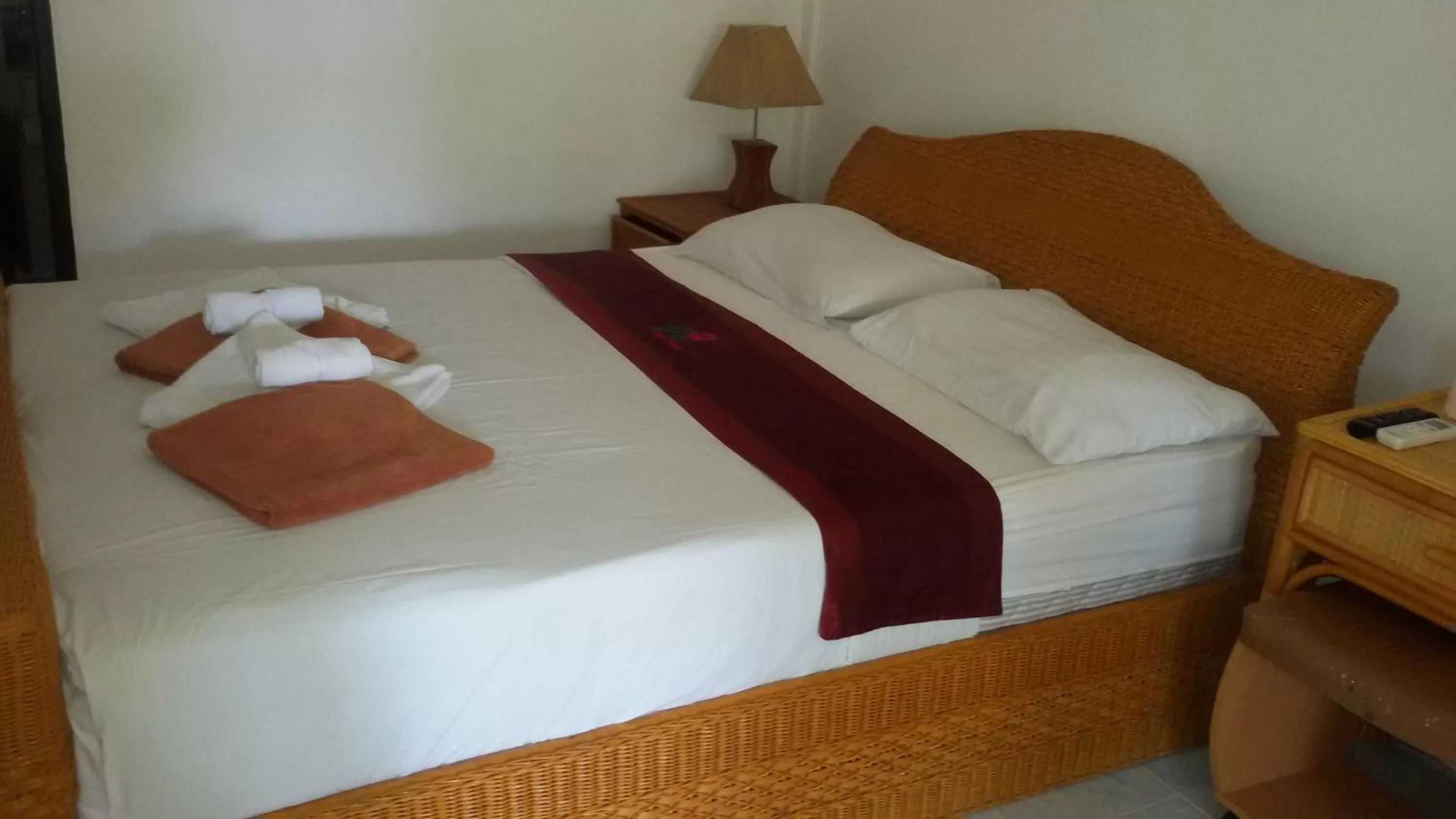 Bed in Jungle Village Bungalow