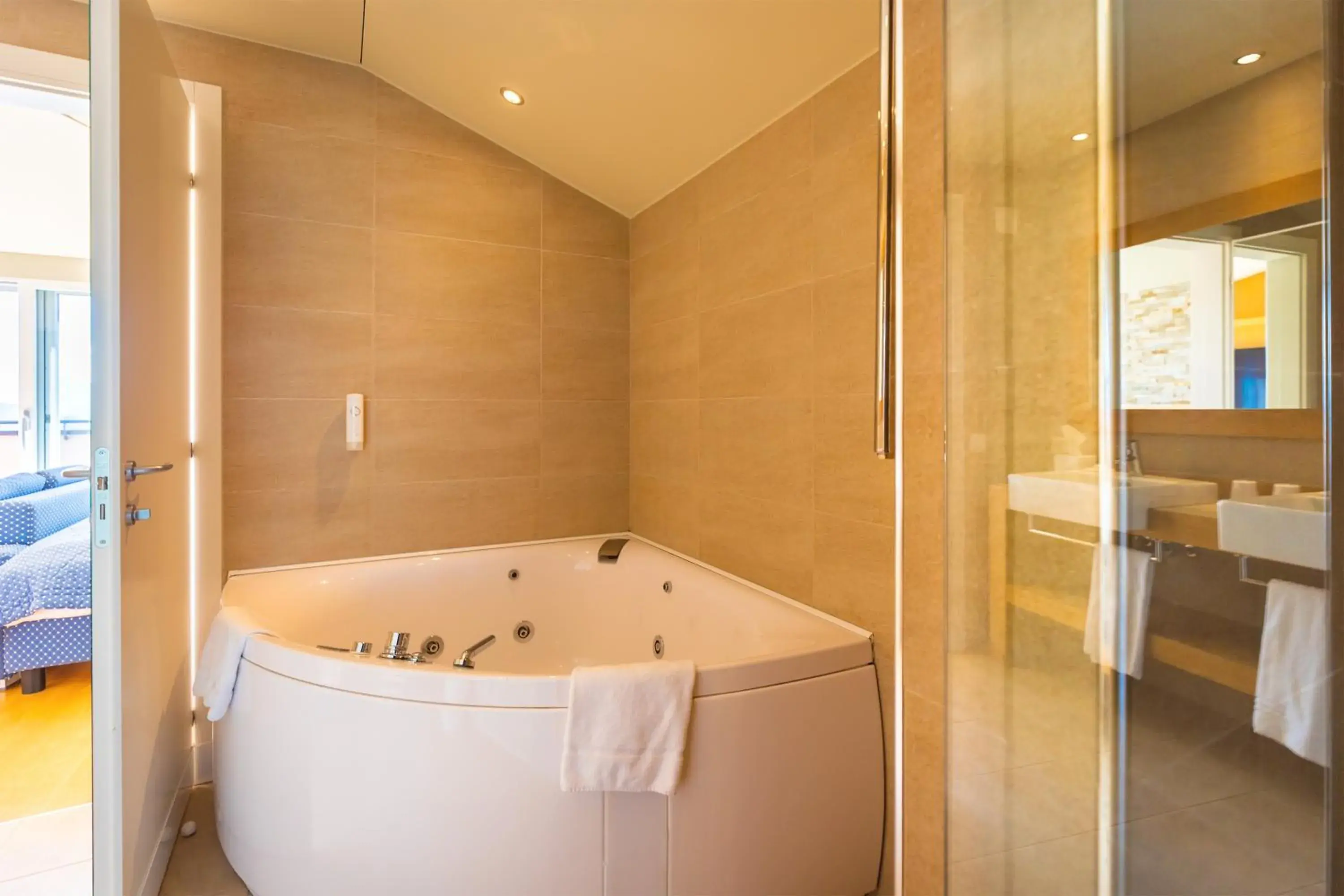 Bathroom in Kurhaus Cademario Hotel & DOT Spa - Ticino Hotels Group