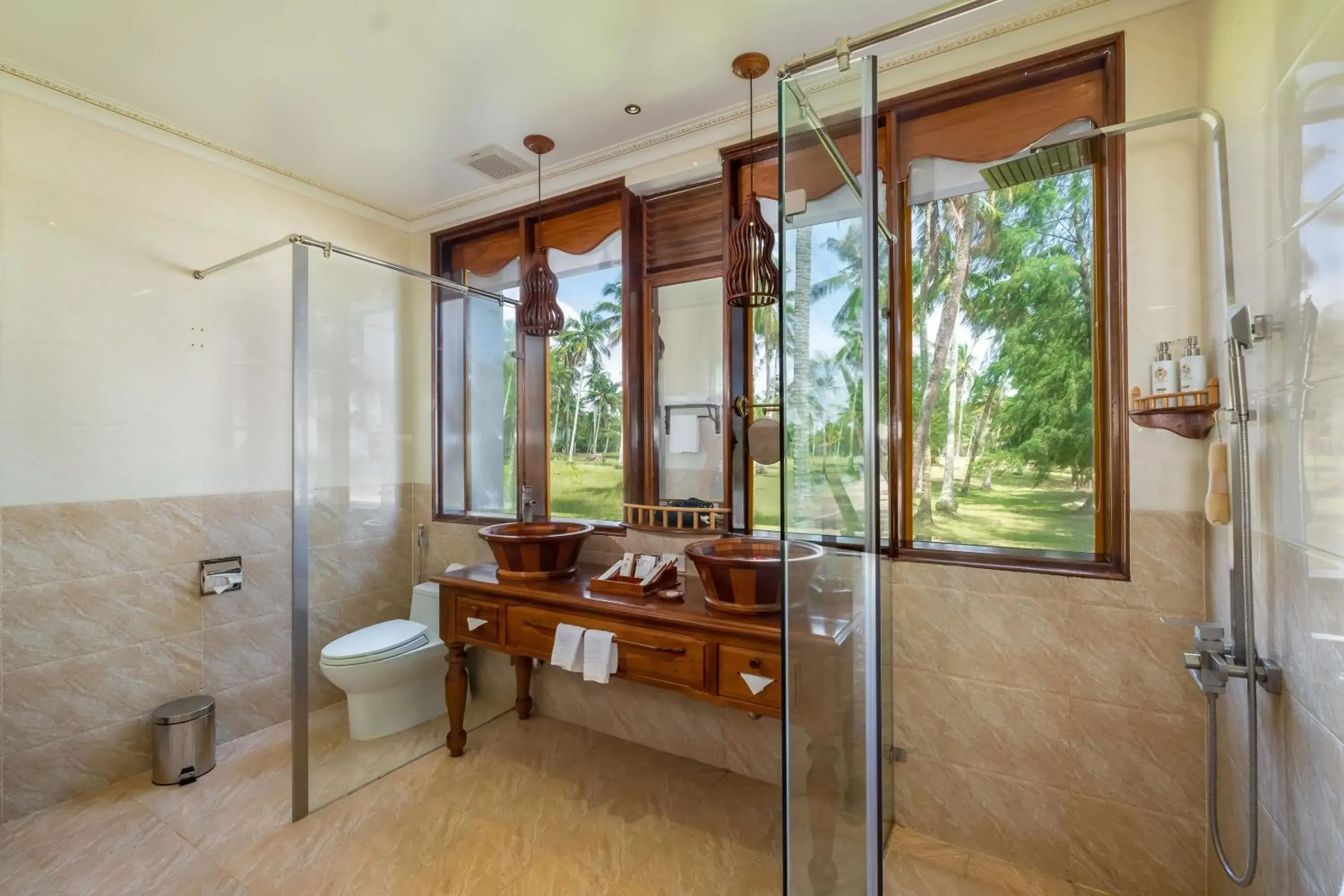 Bathroom in Coco Palm Beach Resort & Spa