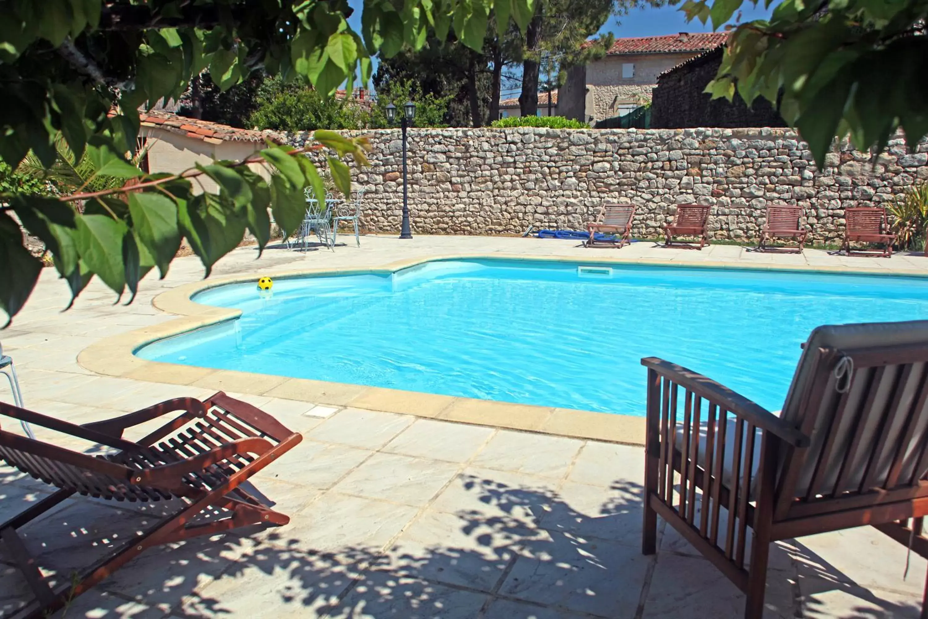 Swimming Pool in Logis Hotel Restaurant L'Esquielle