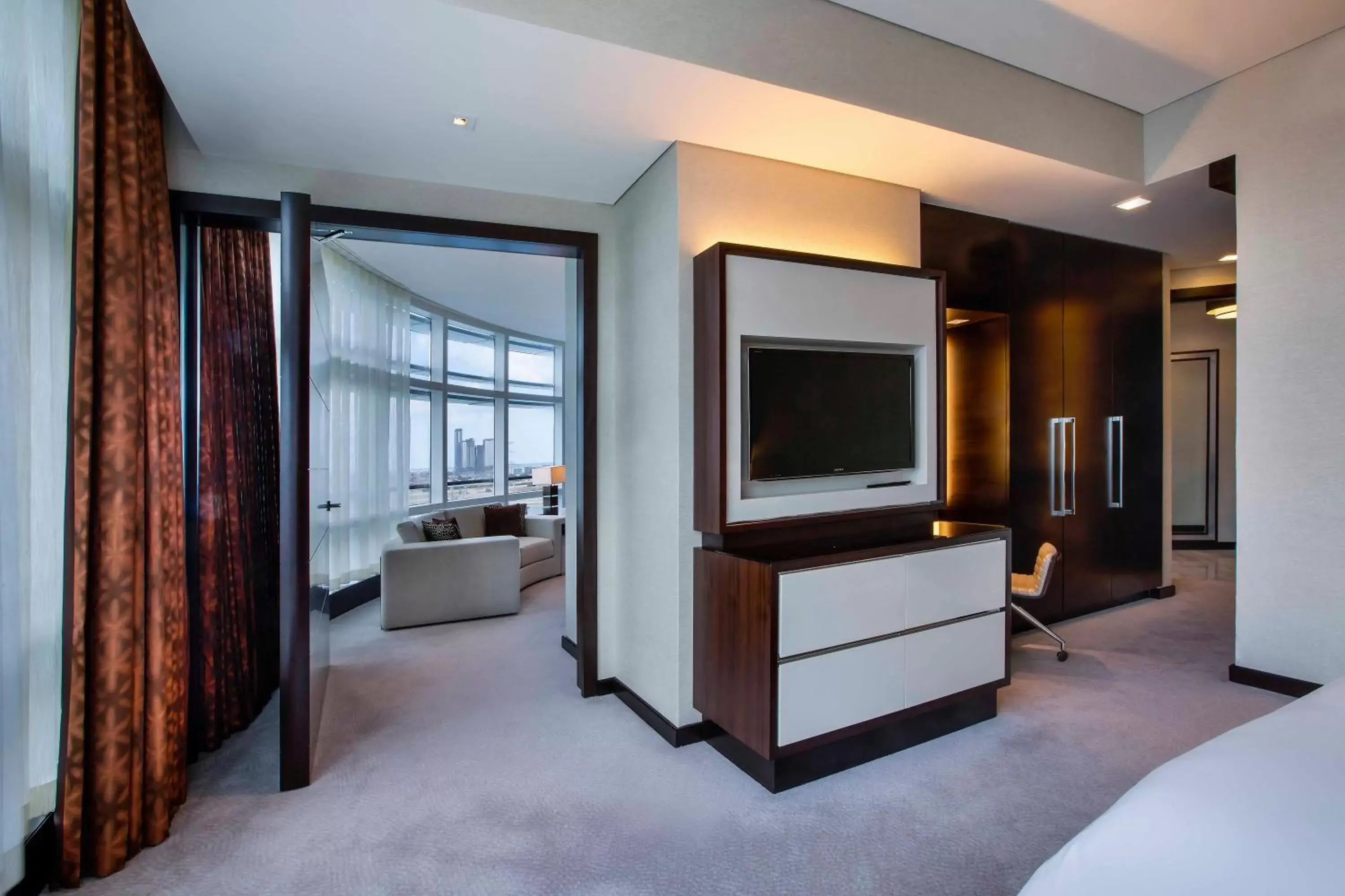 Bathroom, TV/Entertainment Center in Rosewood Abu Dhabi