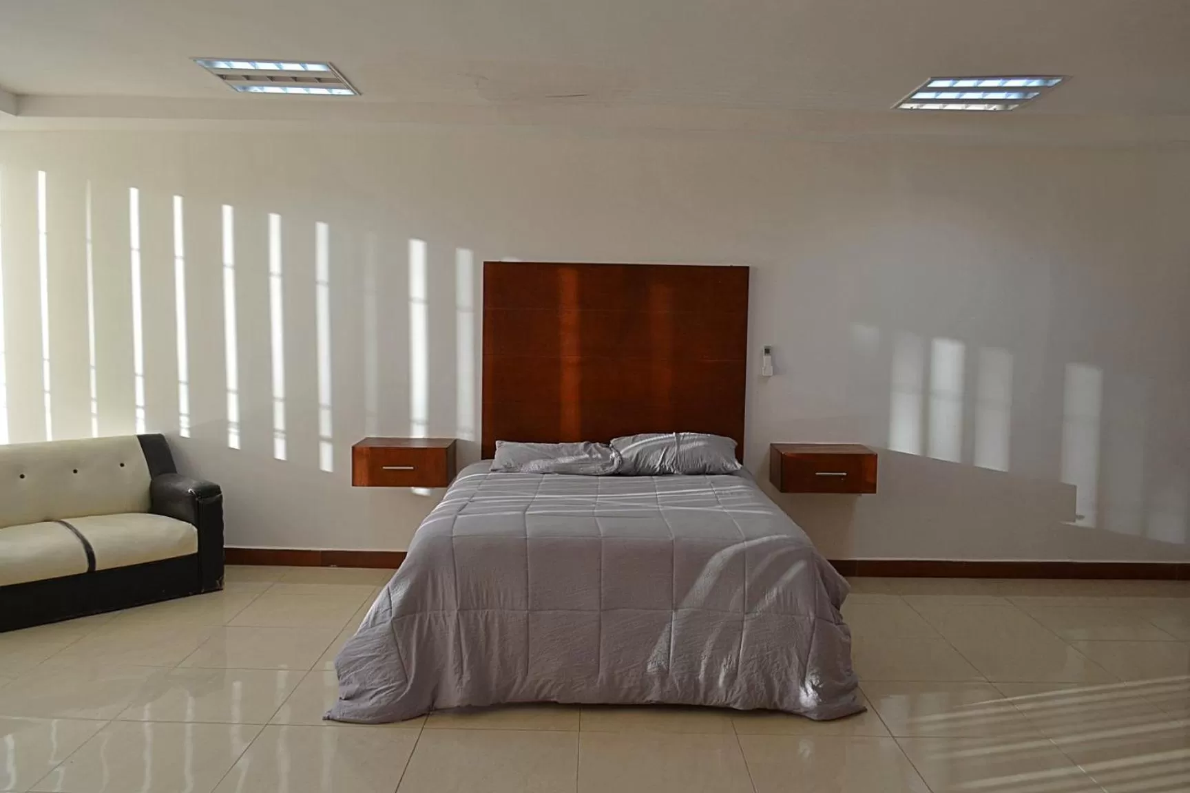 Photo of the whole room, Bed in Departamentos Bonsai