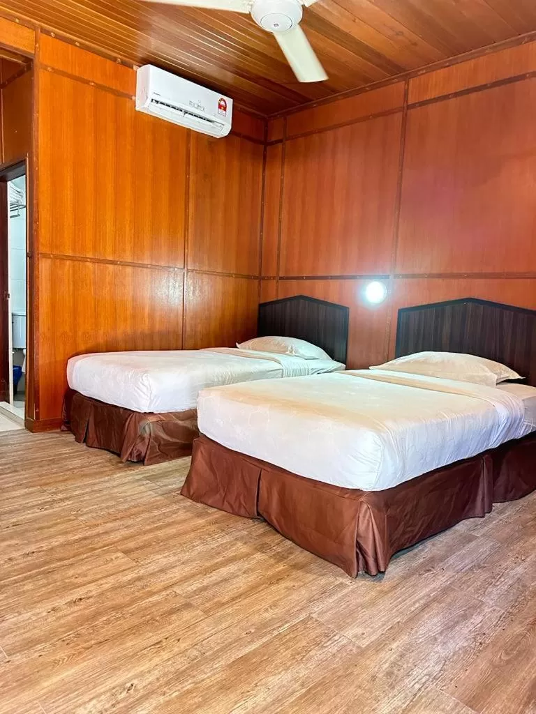 Bed in Malibest Resort