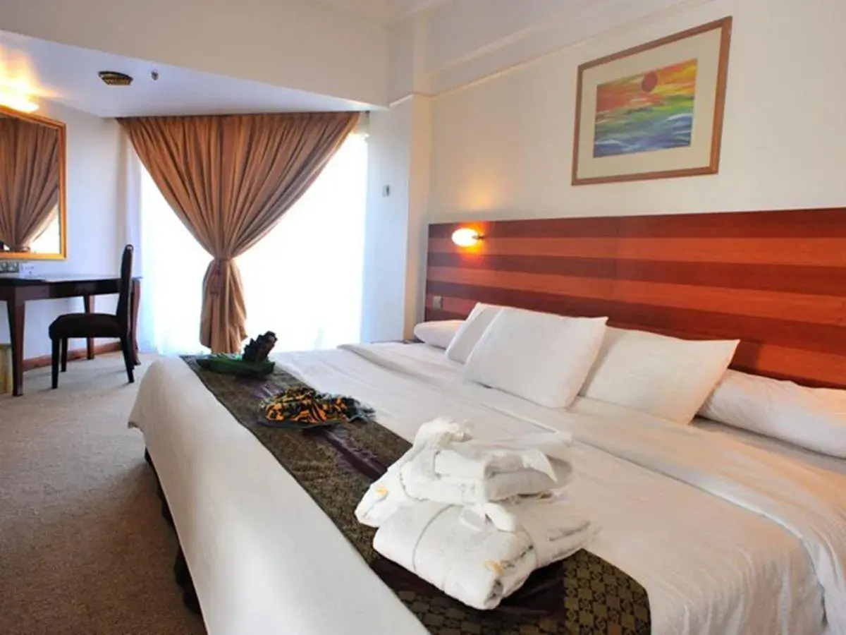 Bed in Primula Beach Hotel