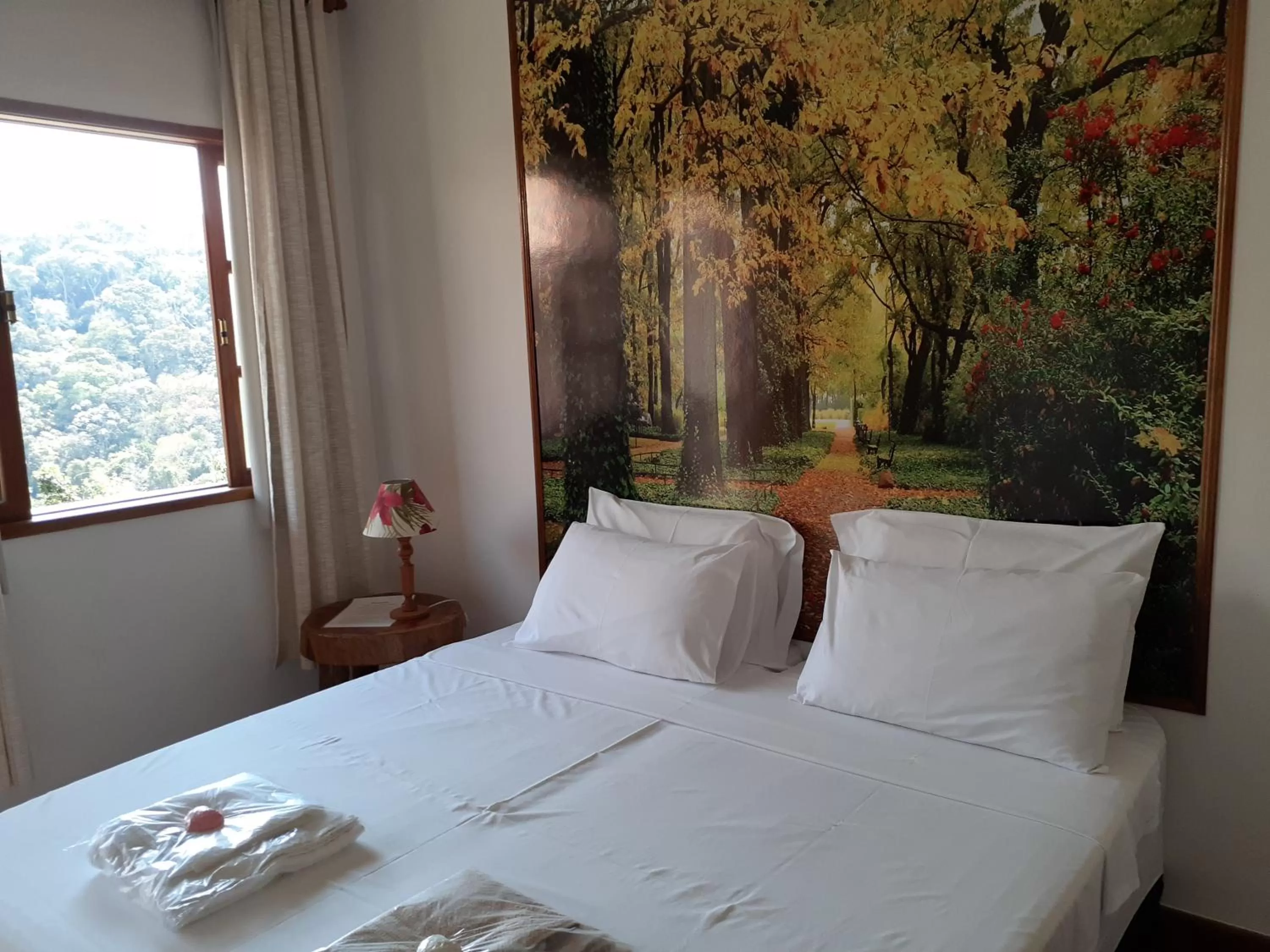 Bed in Pousada R.N.C. Nosso Paraíso