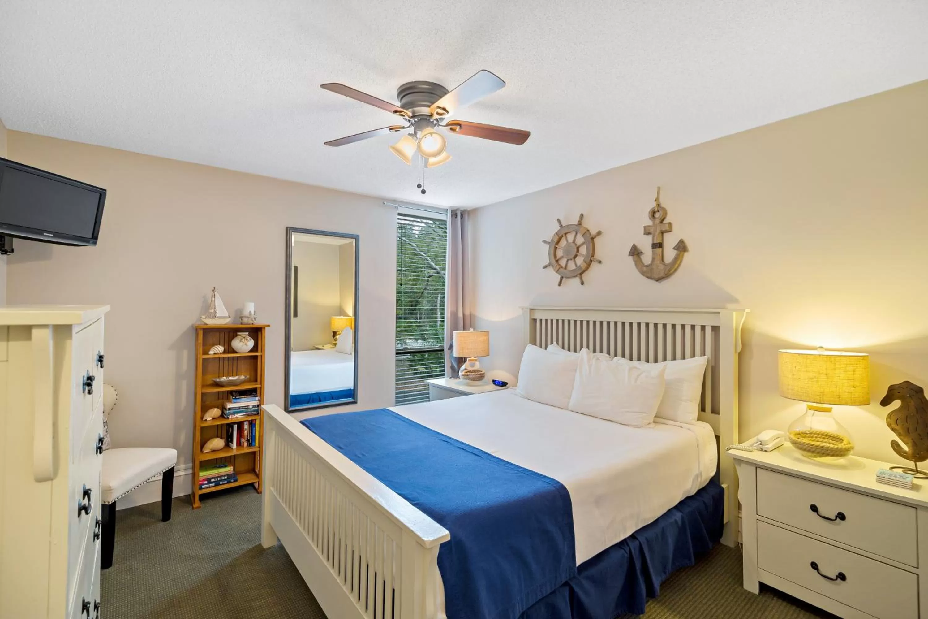 Bed in Villas by the Sea Resort & Conference Center