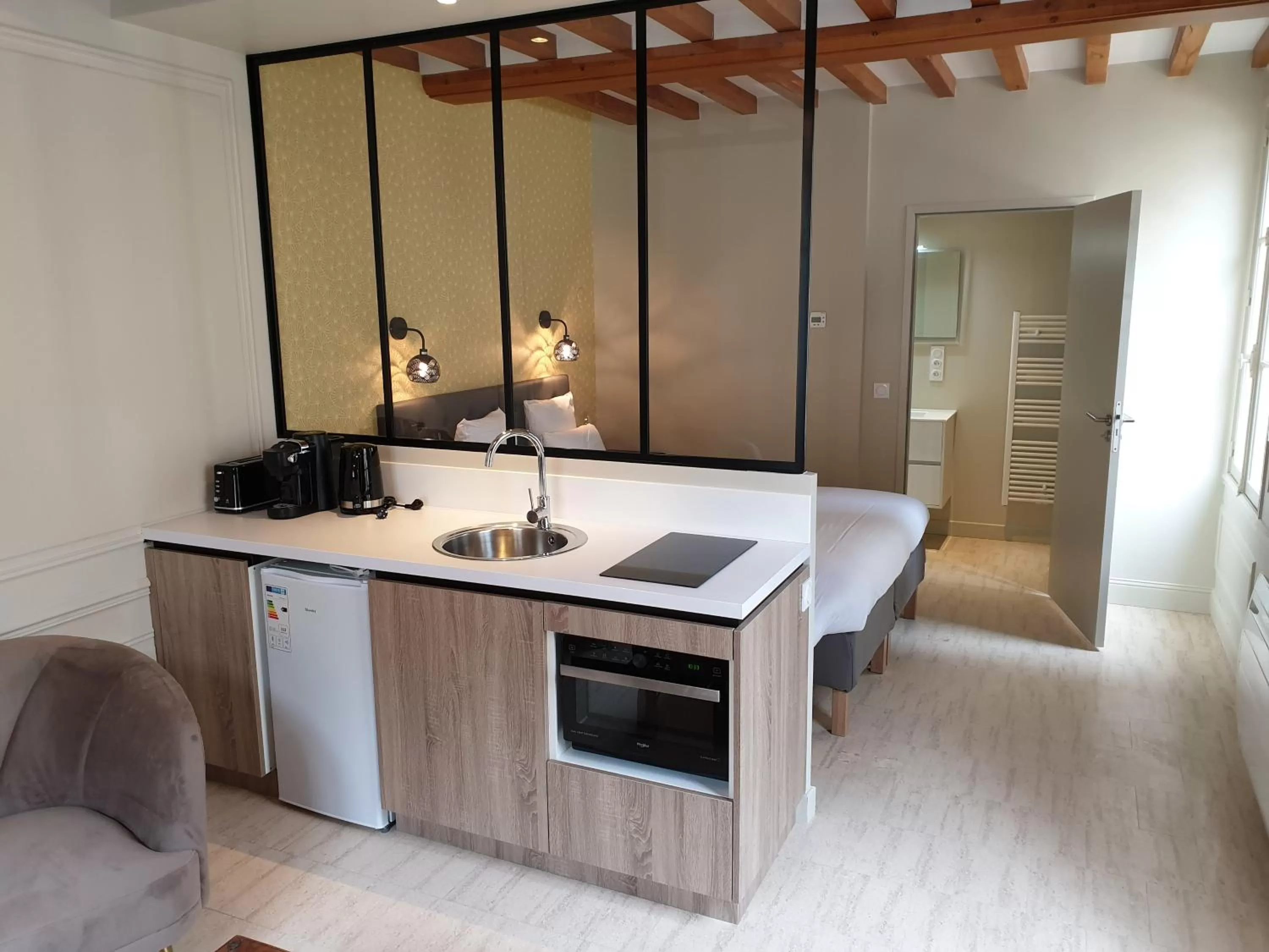 Kitchen or kitchenette in Au Loup Historic Apartments