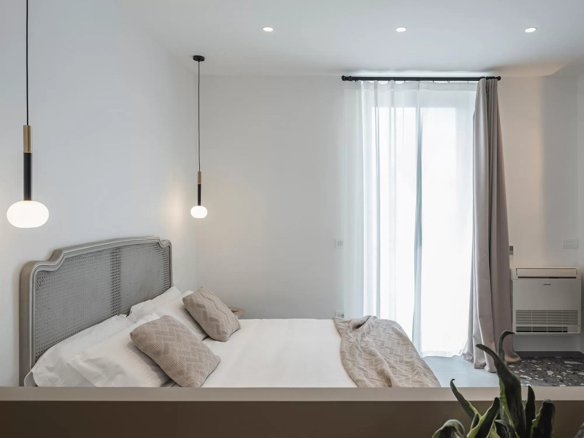 Bed in Living u HomeSuites