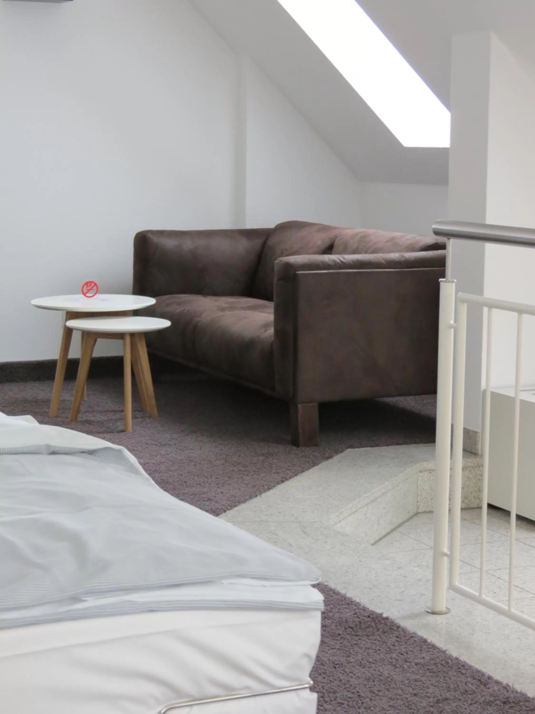 Living room, Bed in Comfor Hotel Ulm City