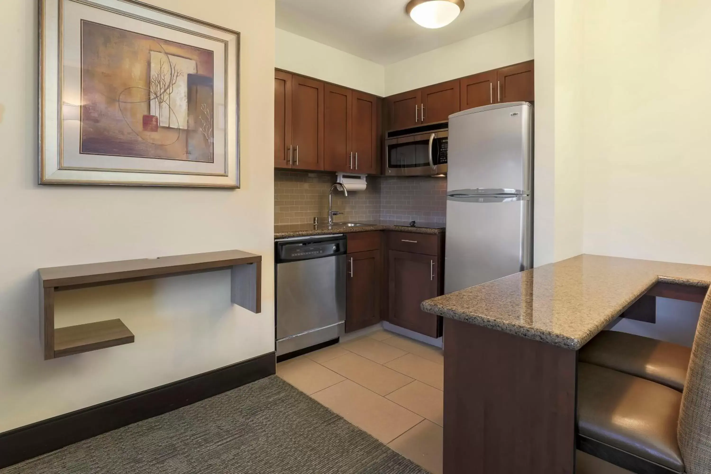 Photo of the whole room, Kitchen/Kitchenette in Staybridge Suites Reno Nevada, an IHG Hotel