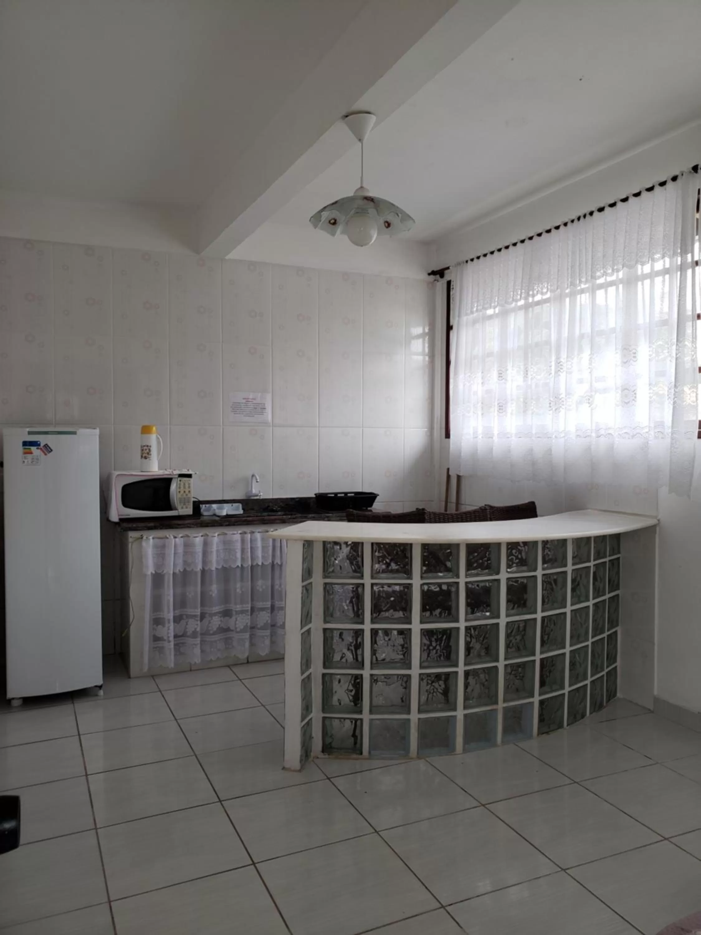 Kitchen/Kitchenette in Pousada Recanto Das Emerências