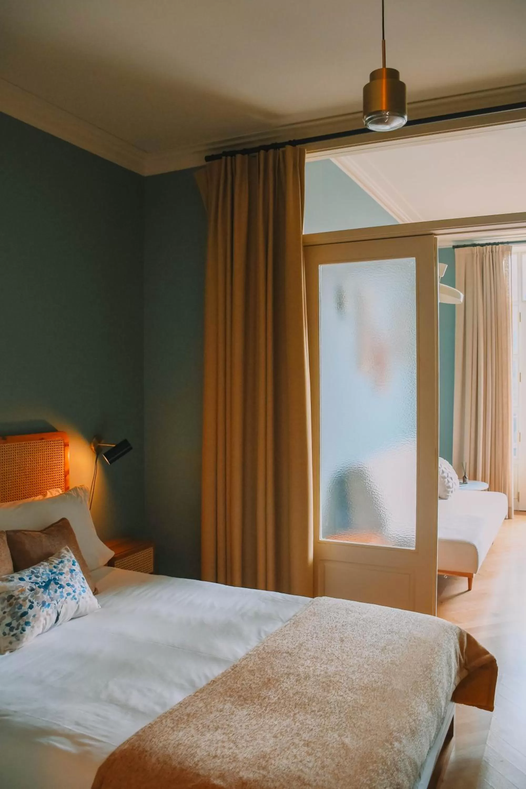 Bed in Villa Theatro Heritage Apartments