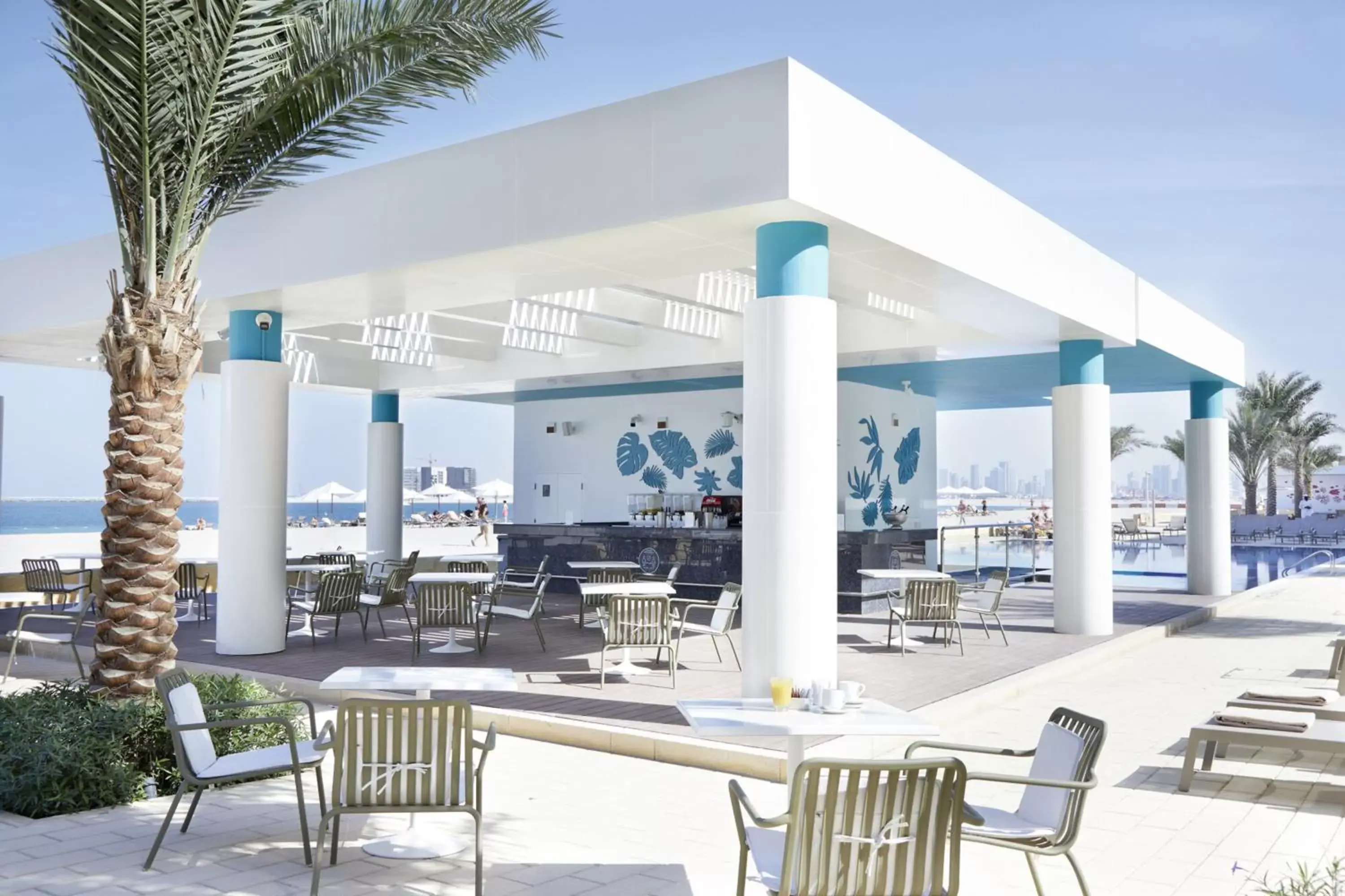 Lounge or bar, Swimming Pool in Riu Dubai Beach Resort - All Inclusive