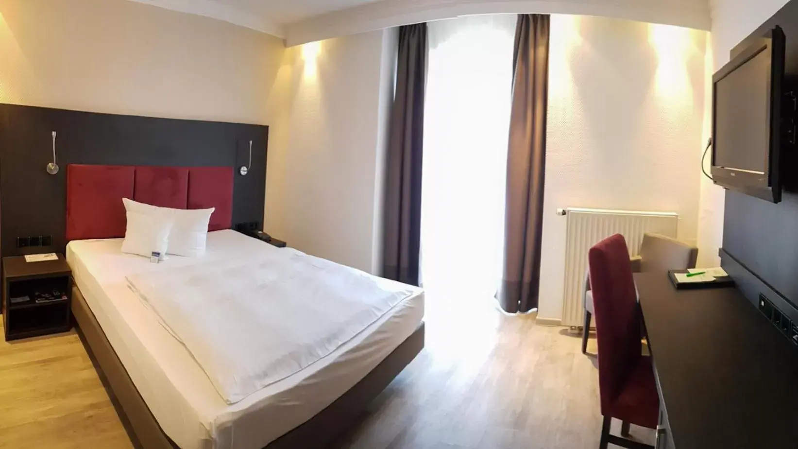 Photo of the whole room, Bed in Astralis Hotel Domizil